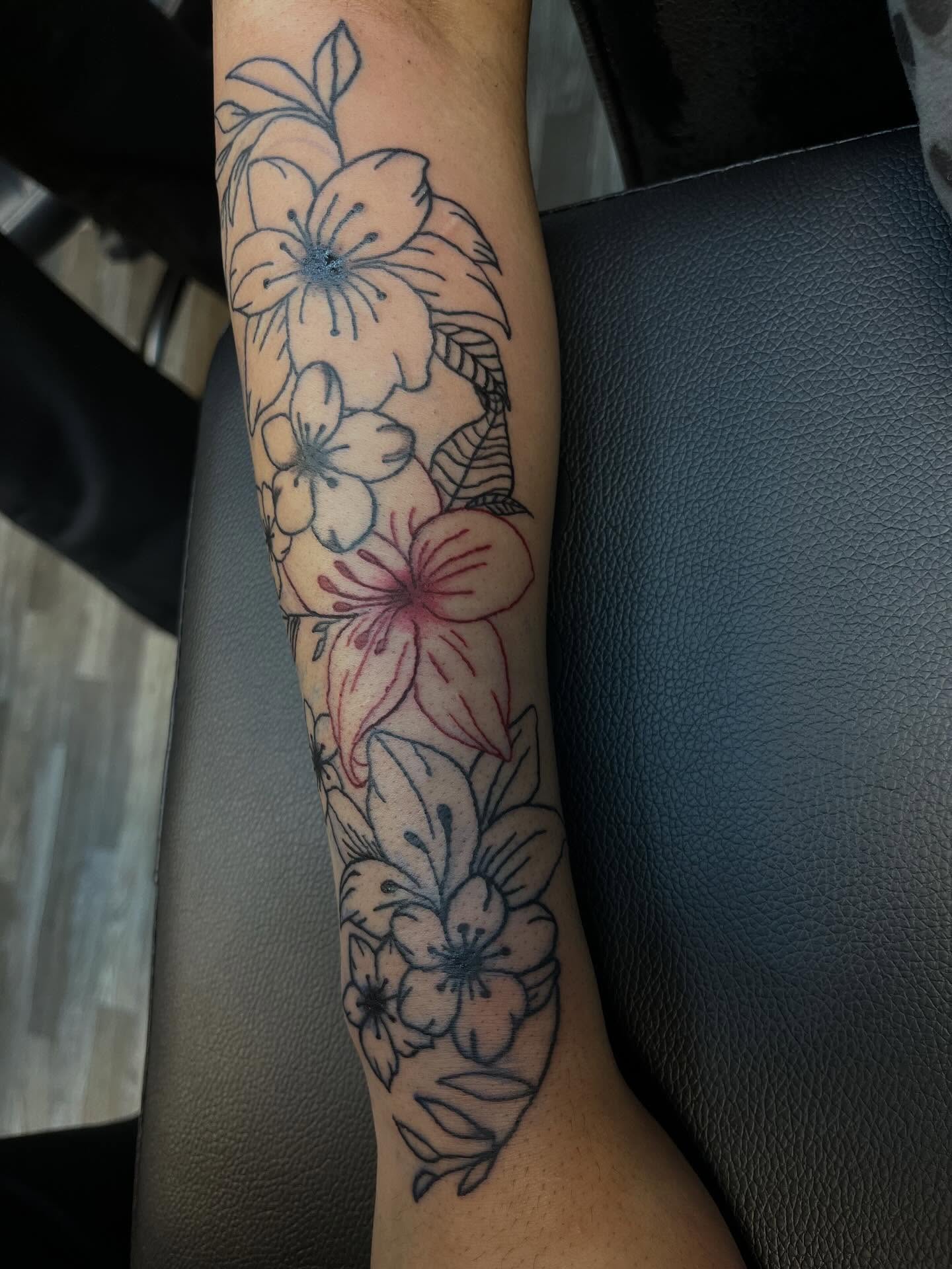 Floral arrangement new school tattoo on the forearm by XoXandrea.Ink, Kansas City, Missouri