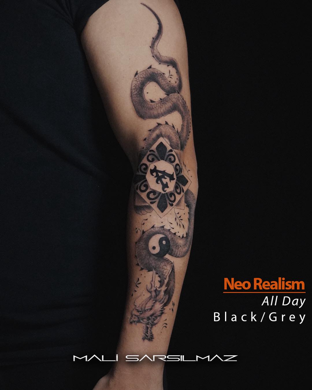 Snake and yin-yang symbol black and grey tattoo on the forearm by Mali Sarsılmaz, Nicosia, Cyprus