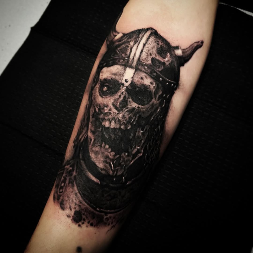 Viking skull realism tattoo on the forearm by 𝖎 𝖆𝖒 𝖗𝖔𝖙𝖙𝖎𝖓𝖌 𝖜𝖎𝖙𝖍 𝖞𝖔𝖚