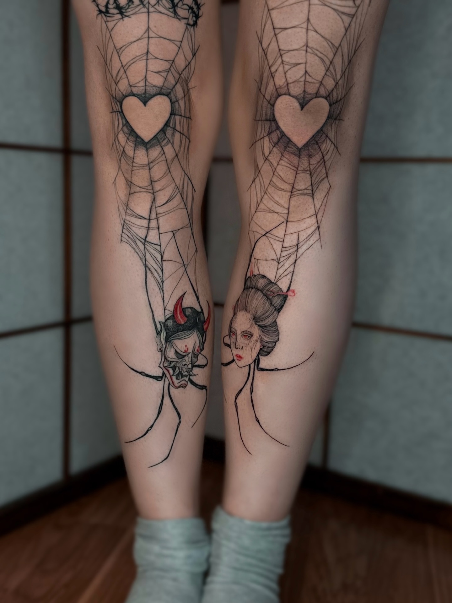 Heart with spiderweb realism tattoo on the leg by Mila, Riga, Latvia