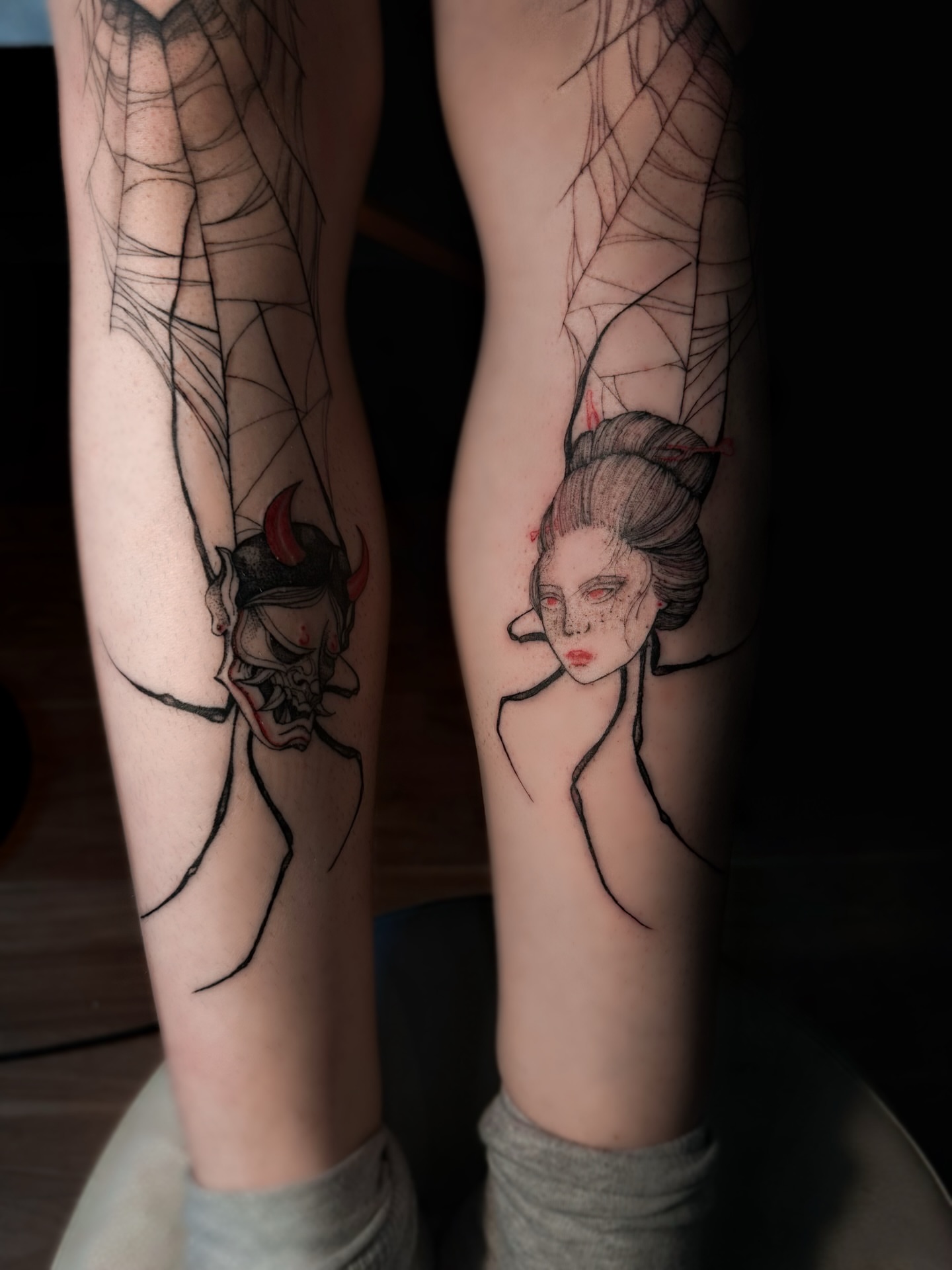 Geisha and demon dotwork tattoo on the leg by Mila, Riga, Latvia