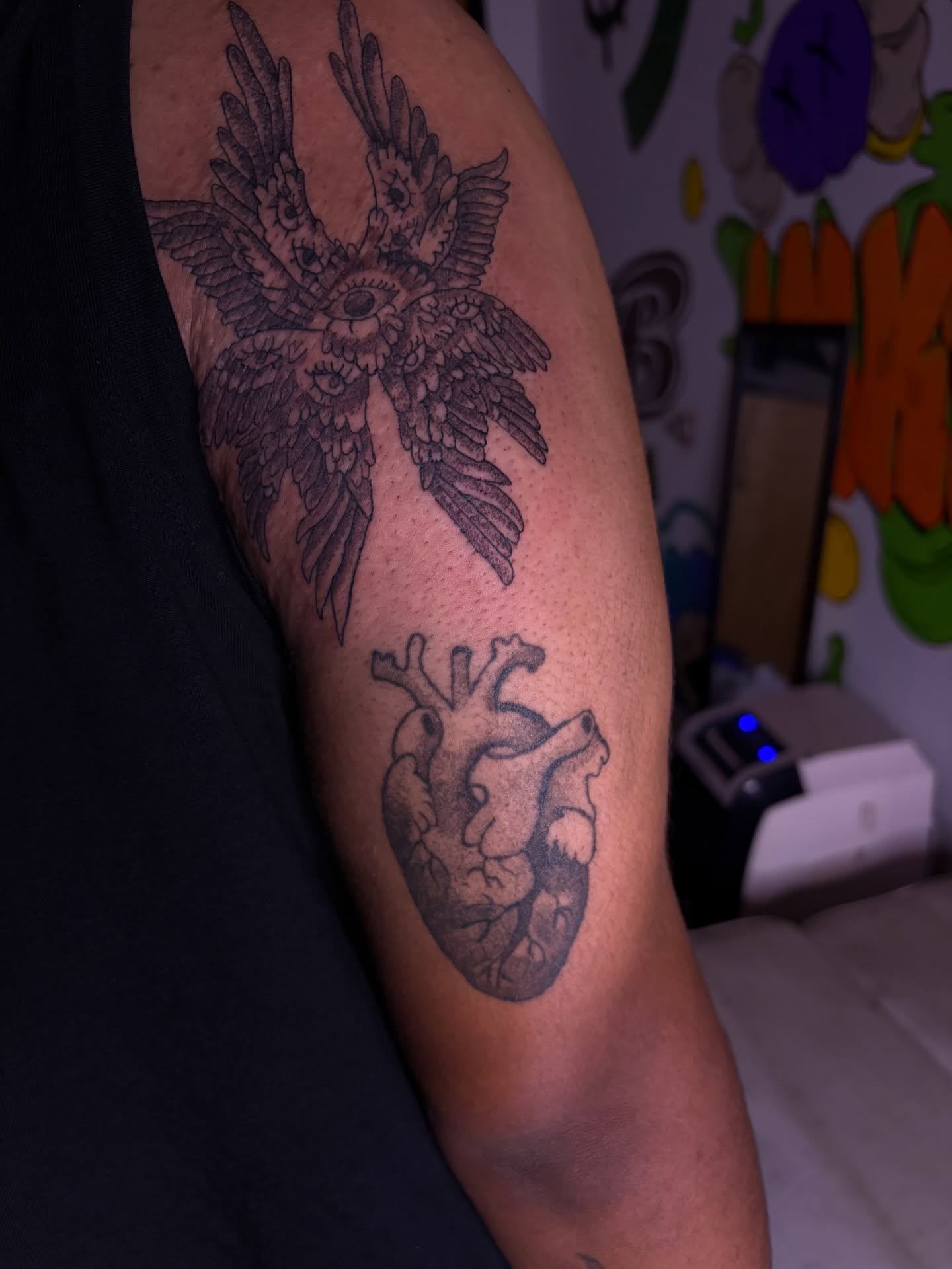 Heart with wings realism tattoo on the forearm by Meela Inks ๐, Richmond, Virginia