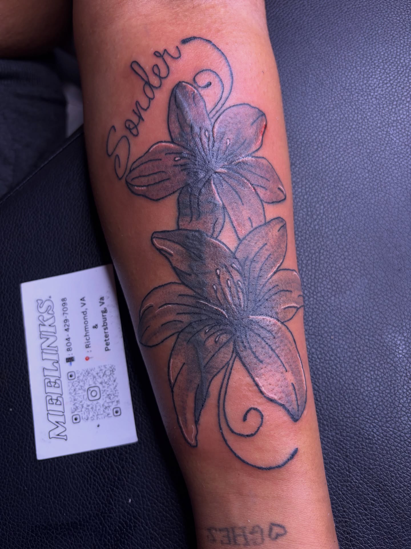 Lilies black and grey tattoo on the forearm by Meela Inks ๐, Richmond, Virginia