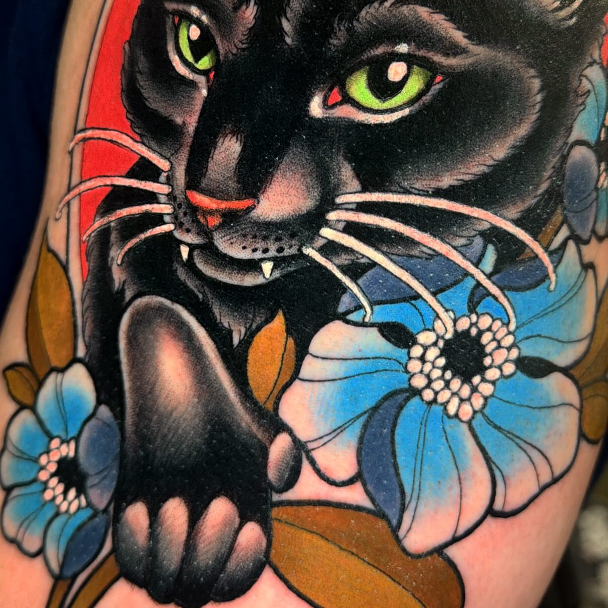 Panther and flowers American traditional tattoo on the forearm by Holli Marie