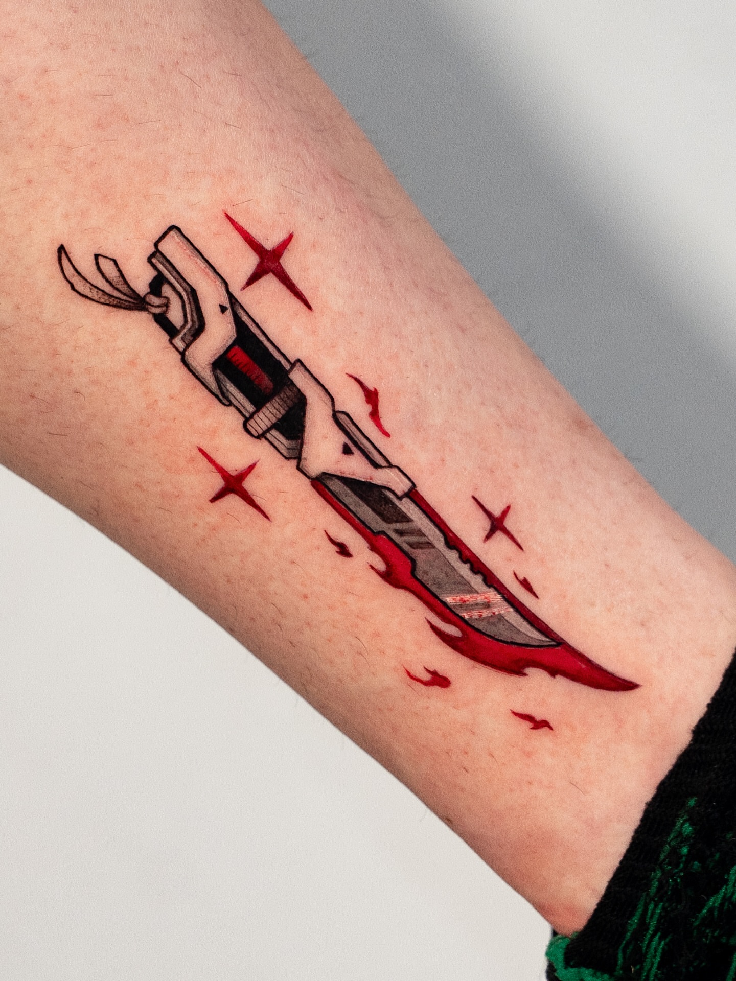 Wrench and knife neo-traditional tattoo on the forearm by Kalin, Seattle, Washington