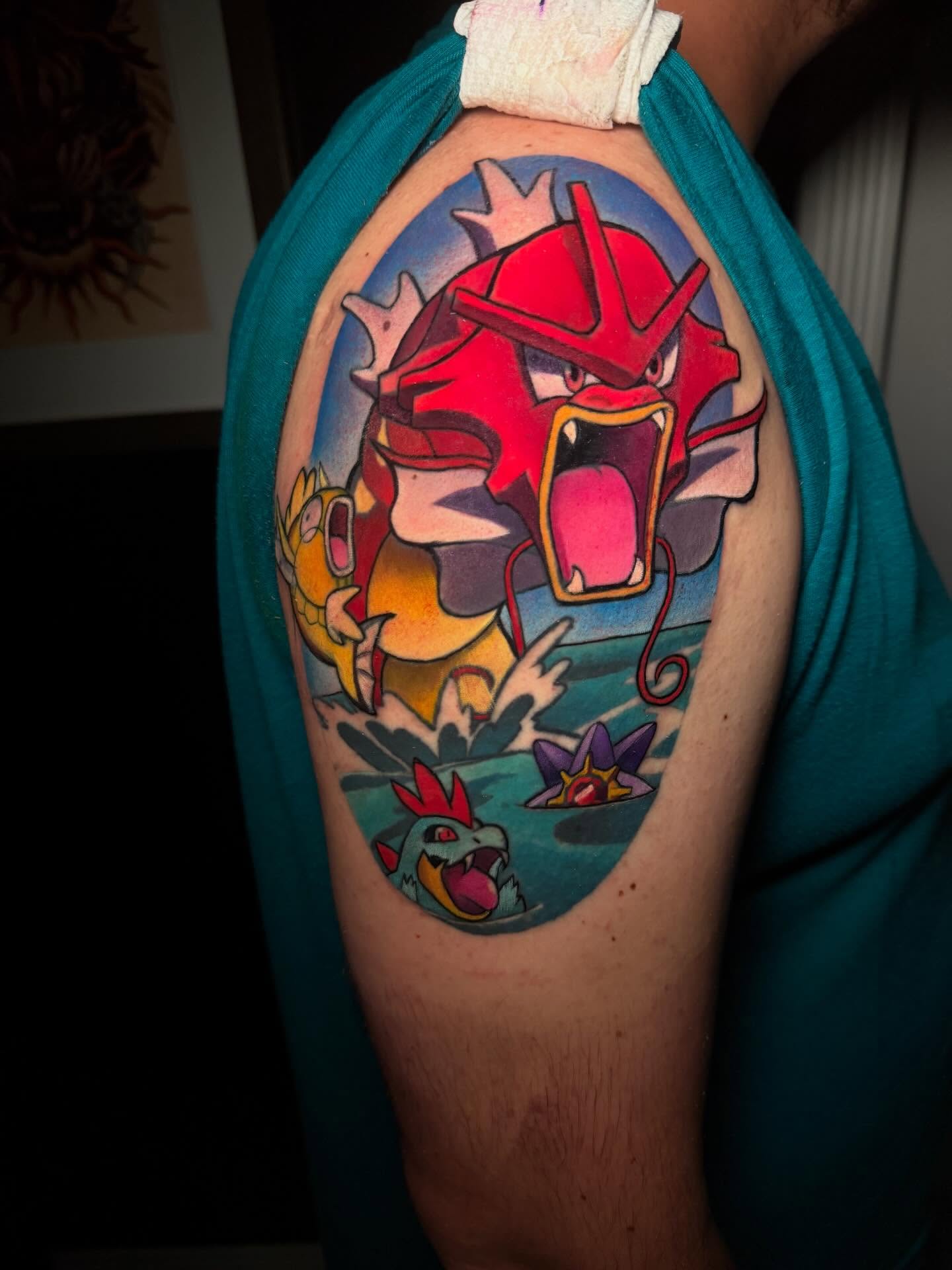 Pokémon anime tattoo on the shoulder by Kenneth Ruiz