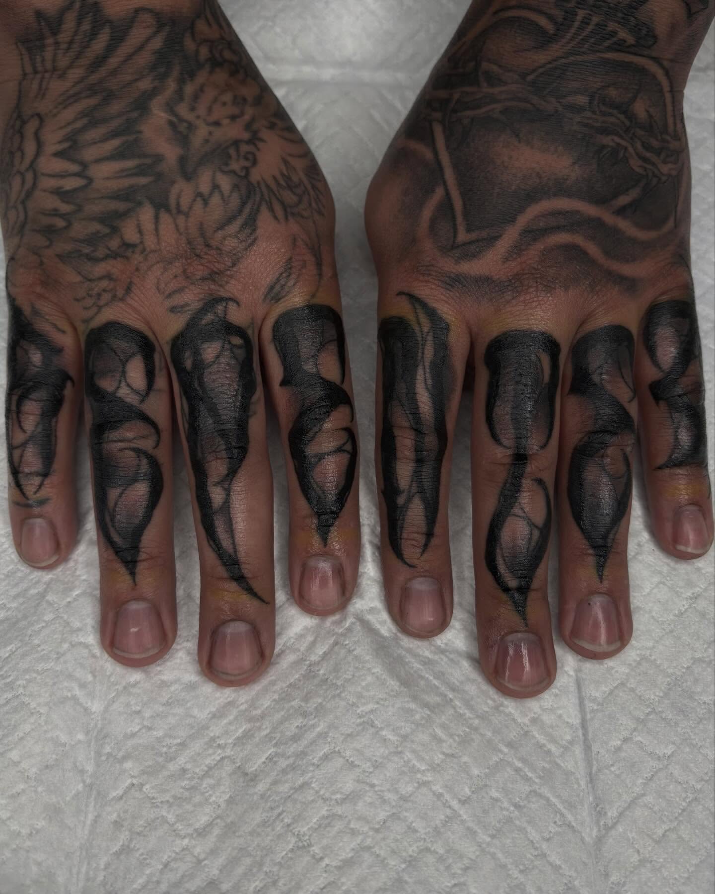 Flames black and grey tattoo on the hand by Trusty Dizon Tattoo Artist