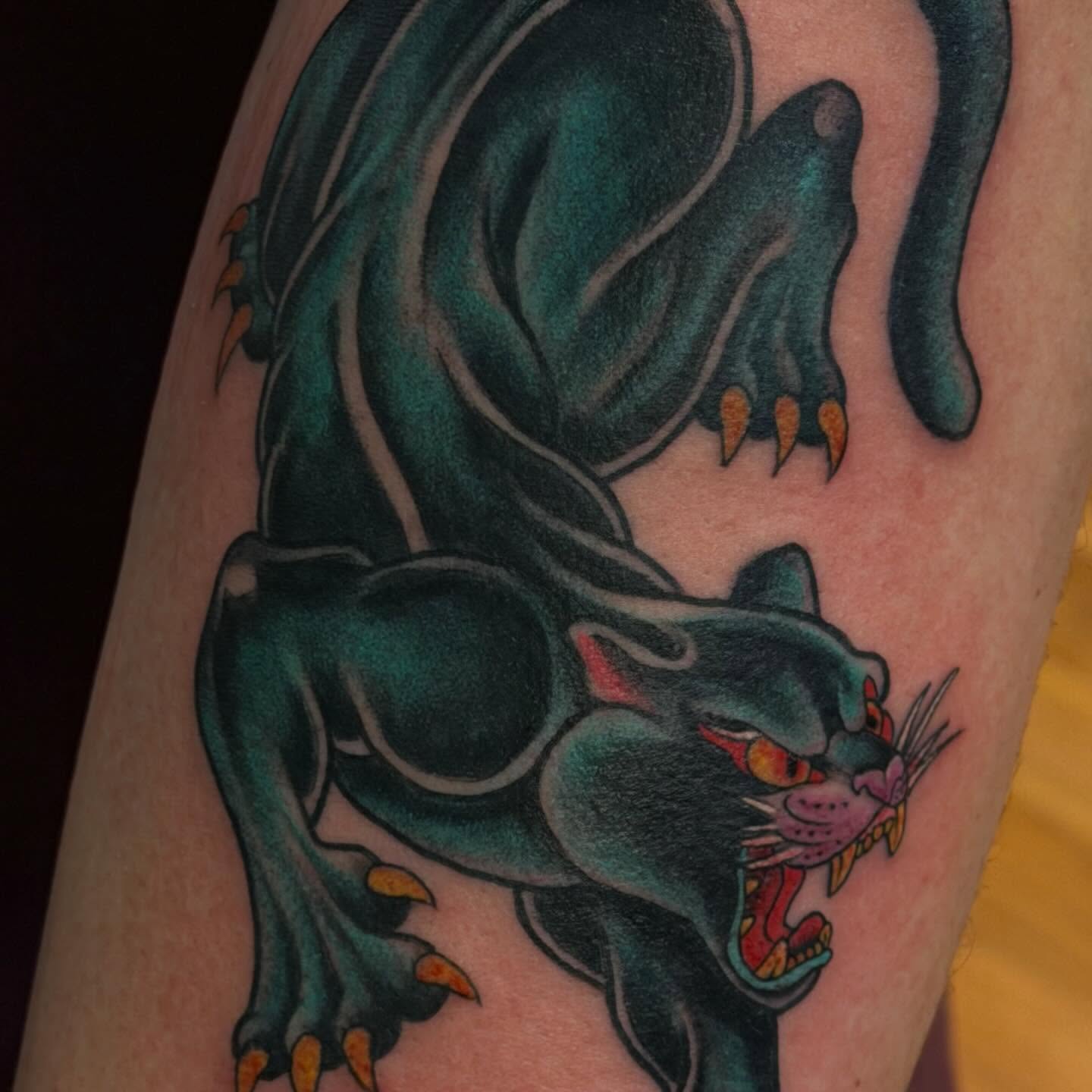 Panther American traditional tattoo on the forearm by Madilynn Klassen
