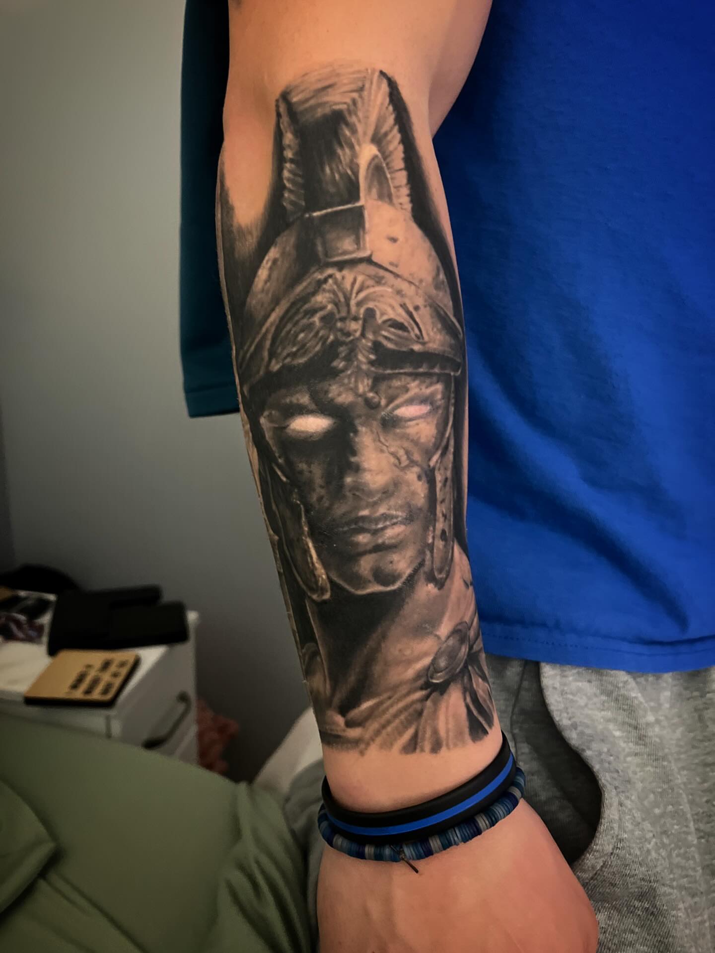 Warrior helmet realism tattoo on the forearm by Neil5one3