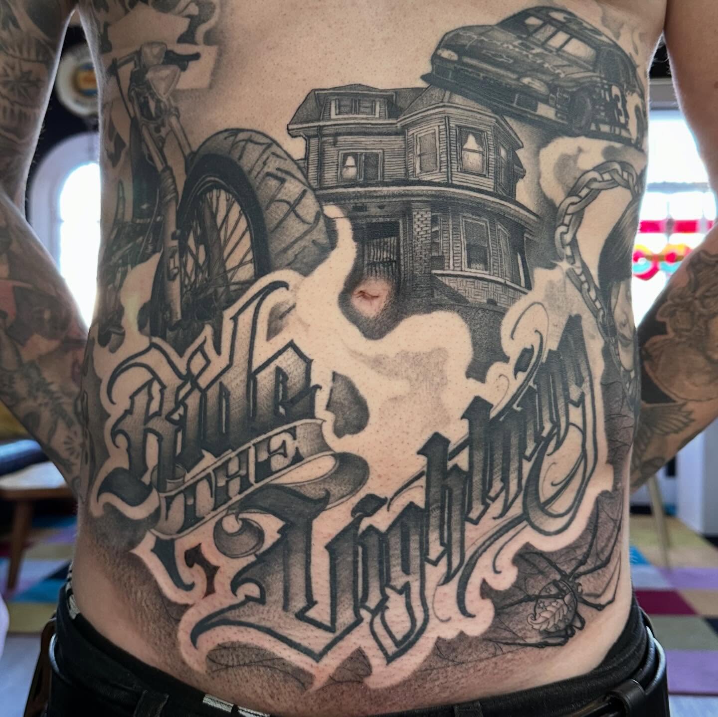 House and motorcycle realism tattoo on the torso by Dustin Clark, Dayton, Ohio