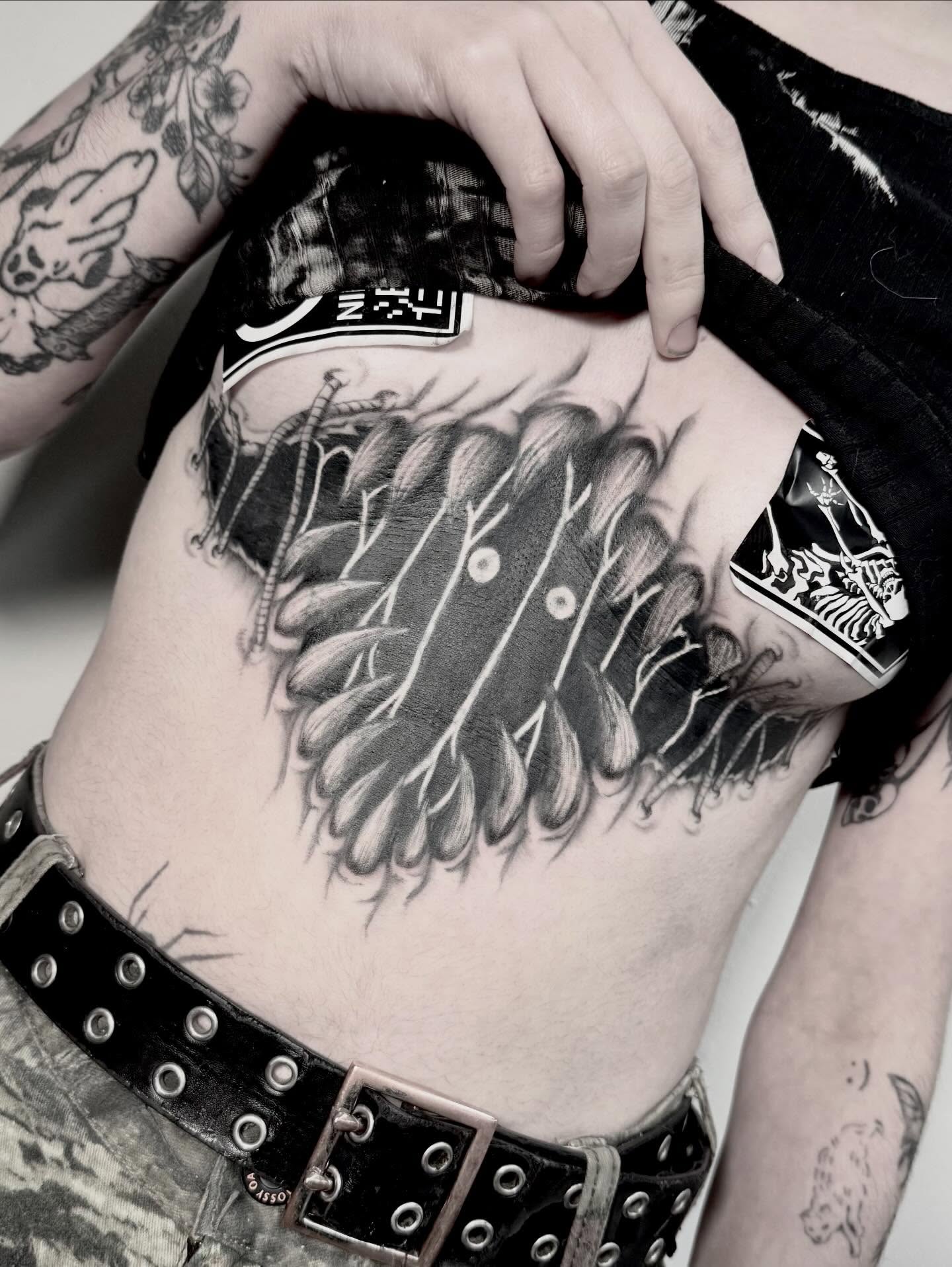 Tattoo by @gutsandink — black_and_grey, realism