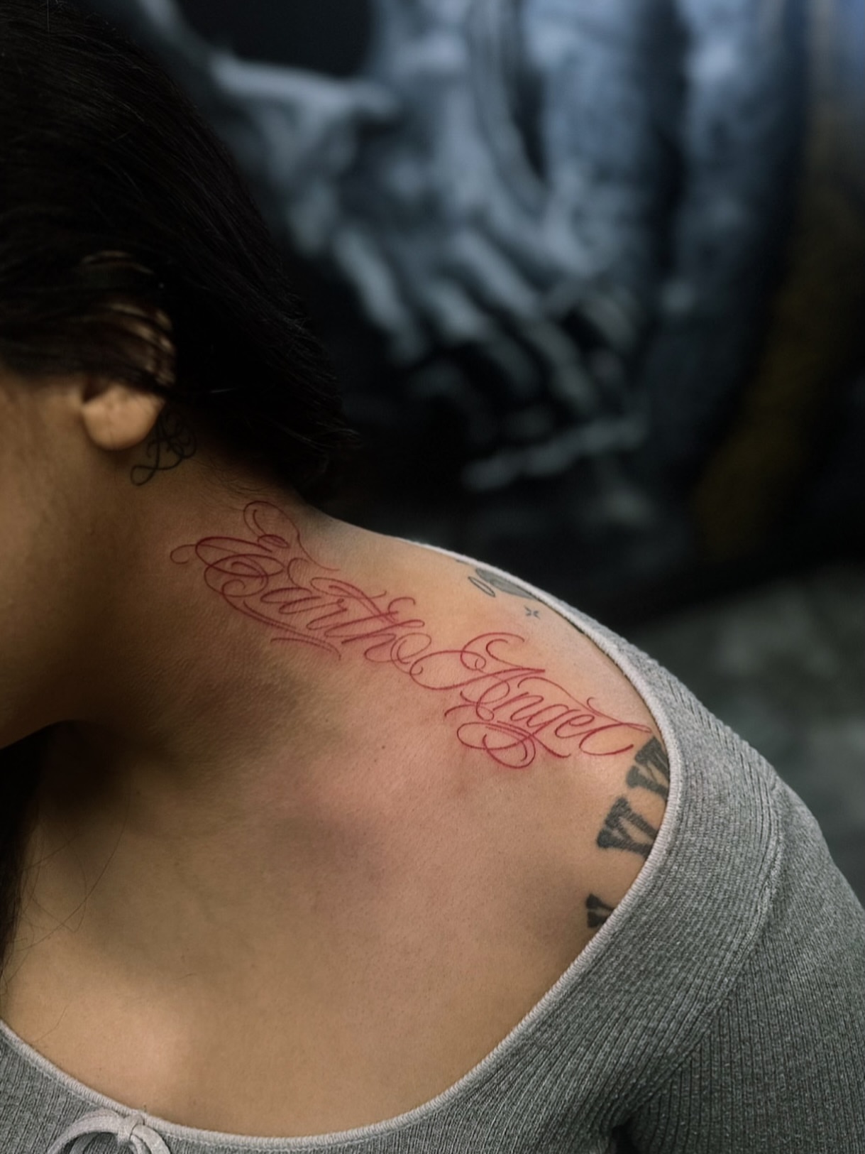 Earth Angel lettering script tattoo on the shoulder by Myles Manuel Lopez, Phoenix, Arizona