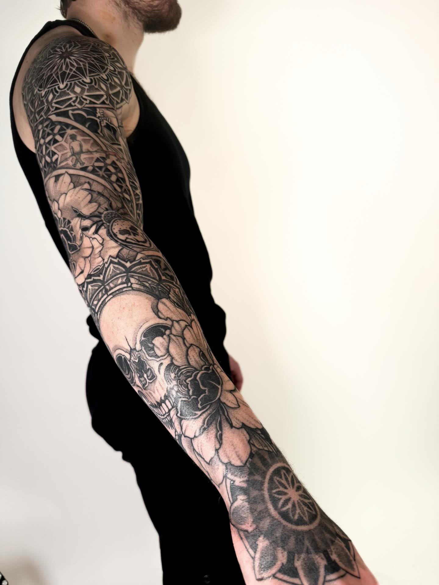 Floral and geometric patterns ornamental tattoo on the forearm by Jamie Beach, Wheat Ridge, Colorado