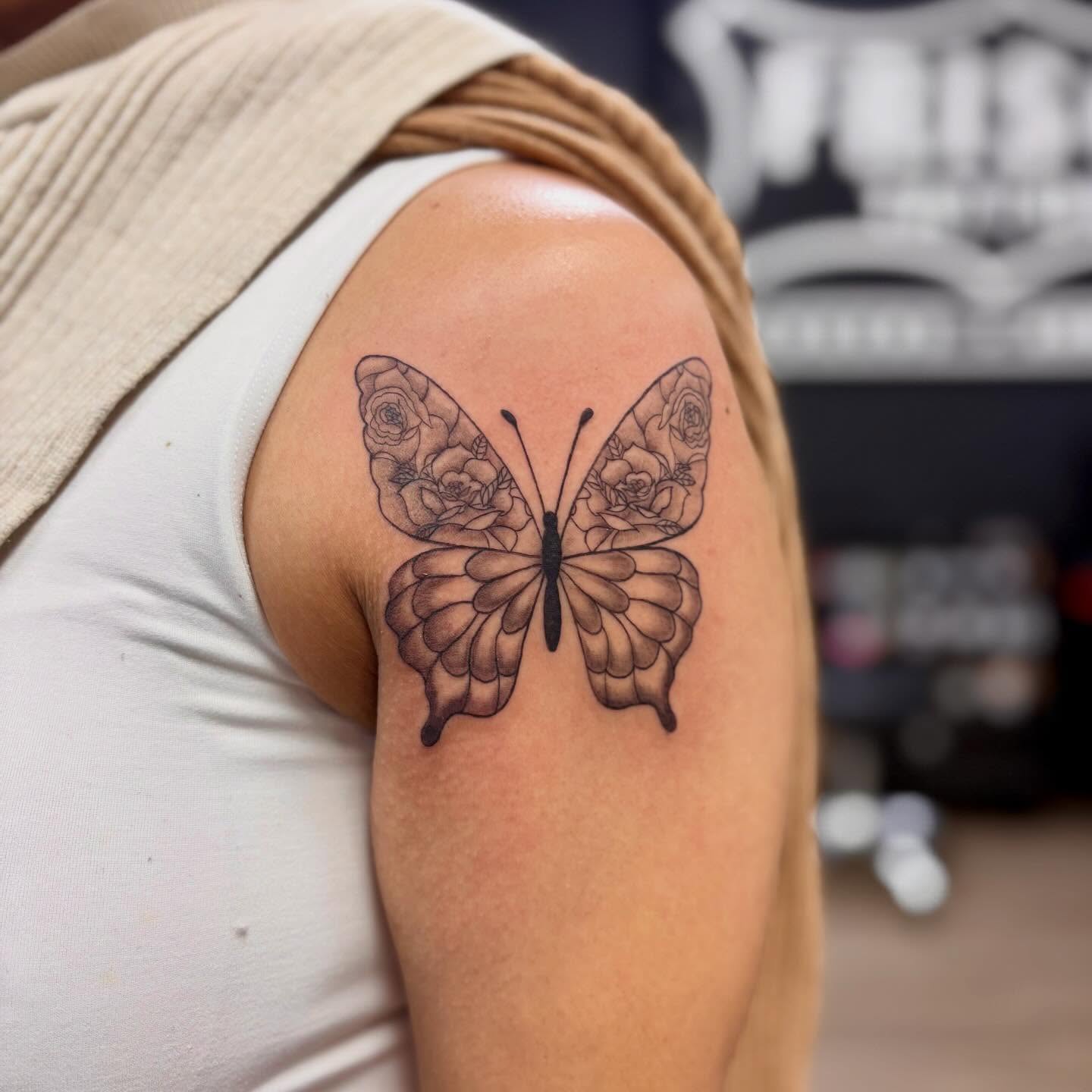 Butterfly black and grey tattoo on the shoulder by bradyn thornton: eco-tattoo artist