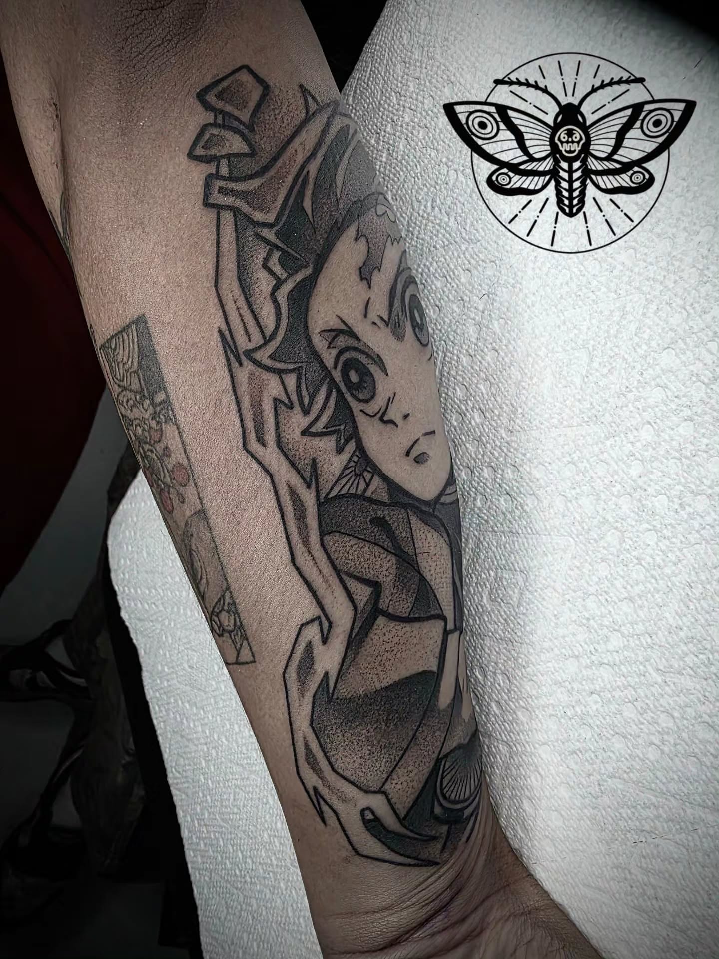 Anime character dotwork tattoo on the forearm by Danny, San Luis Obispo, California