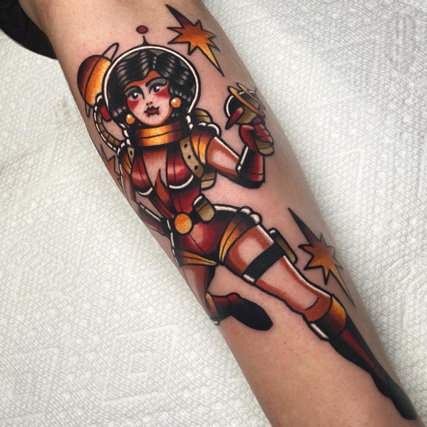 Astronaut American traditional tattoo on the forearm by Matthew Limbers⚜️