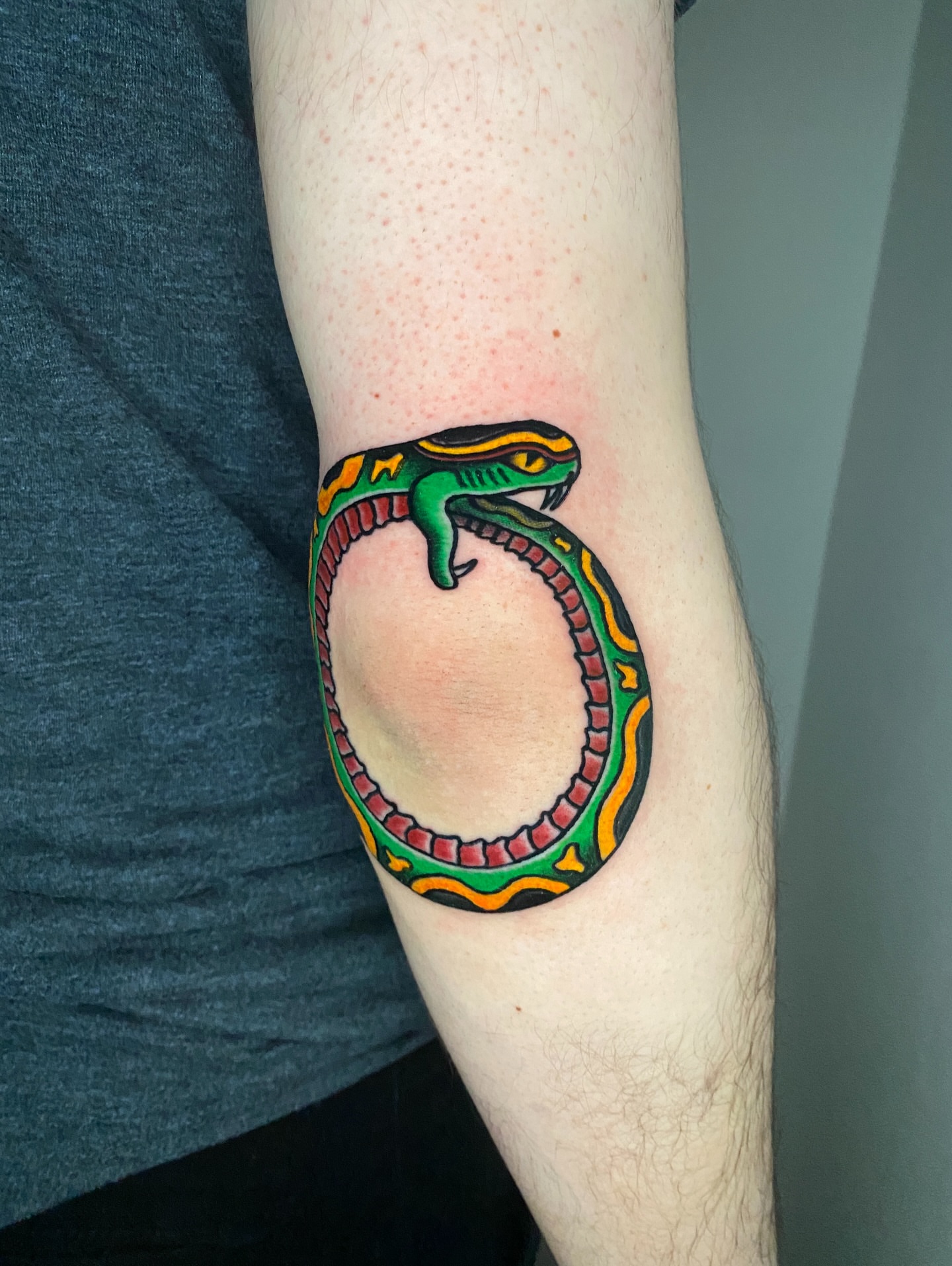 Snake geometric tattoo on the forearm by Aidan Leery, Portland, Oregon