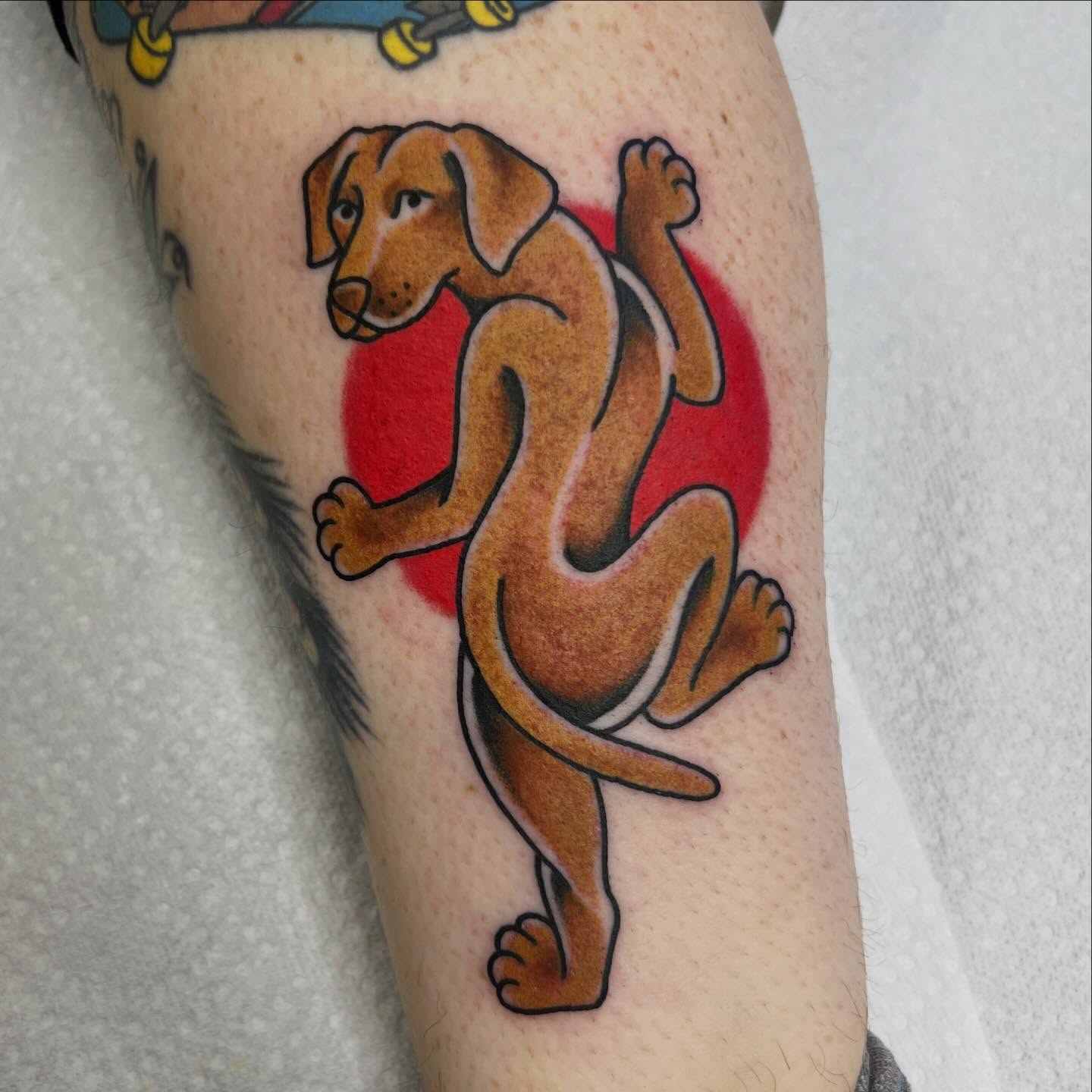 Dog American traditional tattoo on the forearm by Taylor Estrella