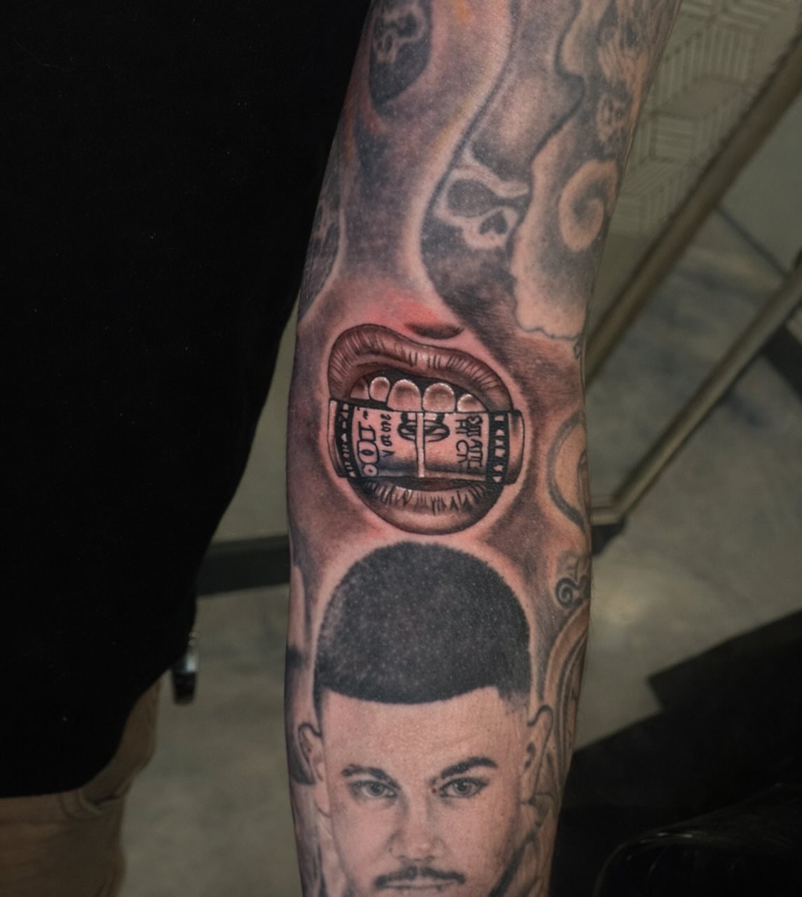 Money mouth black and grey tattoo on the forearm by Shake_tatts