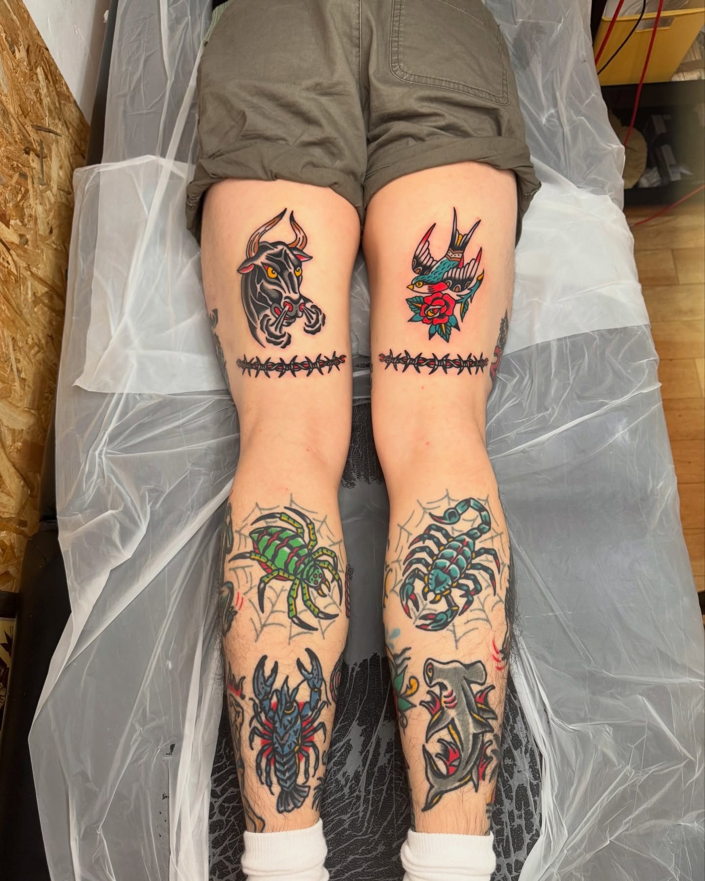 Insect and bird American traditional tattoo on the leg by Oldschool Tattooer