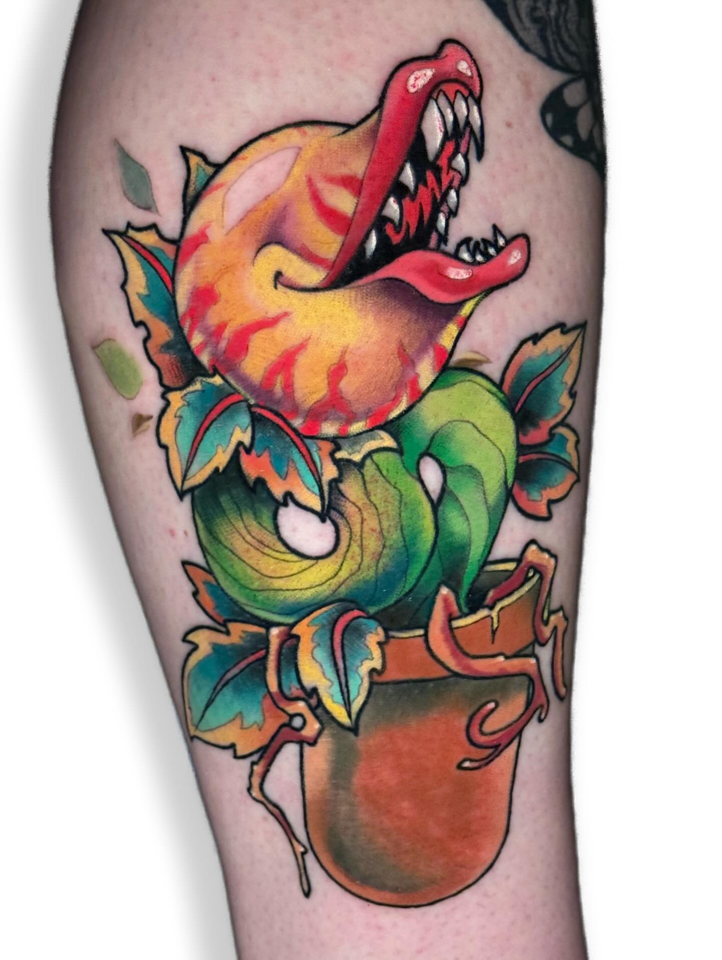 Dragon American traditional tattoo on the forearm by Ash Sansoucie