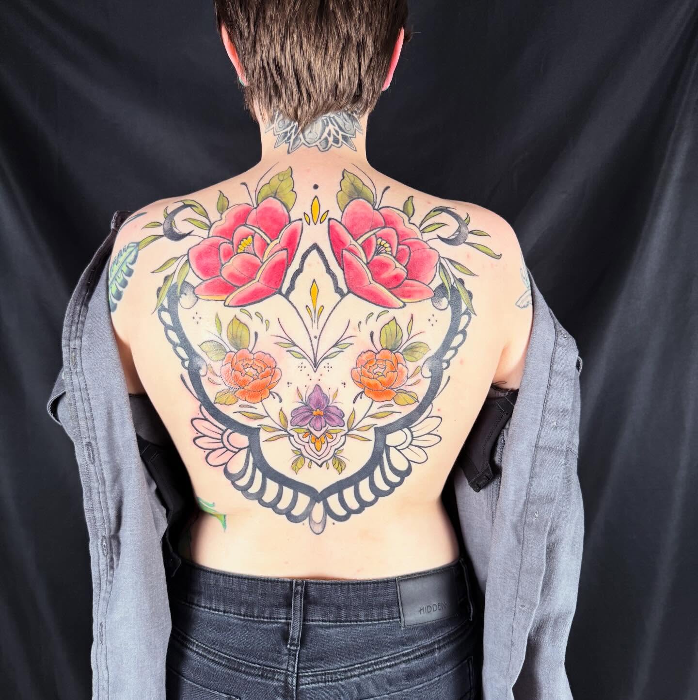 Floral skull American traditional tattoo on the back by Taytum Marsing, Salt Lake City, Utah