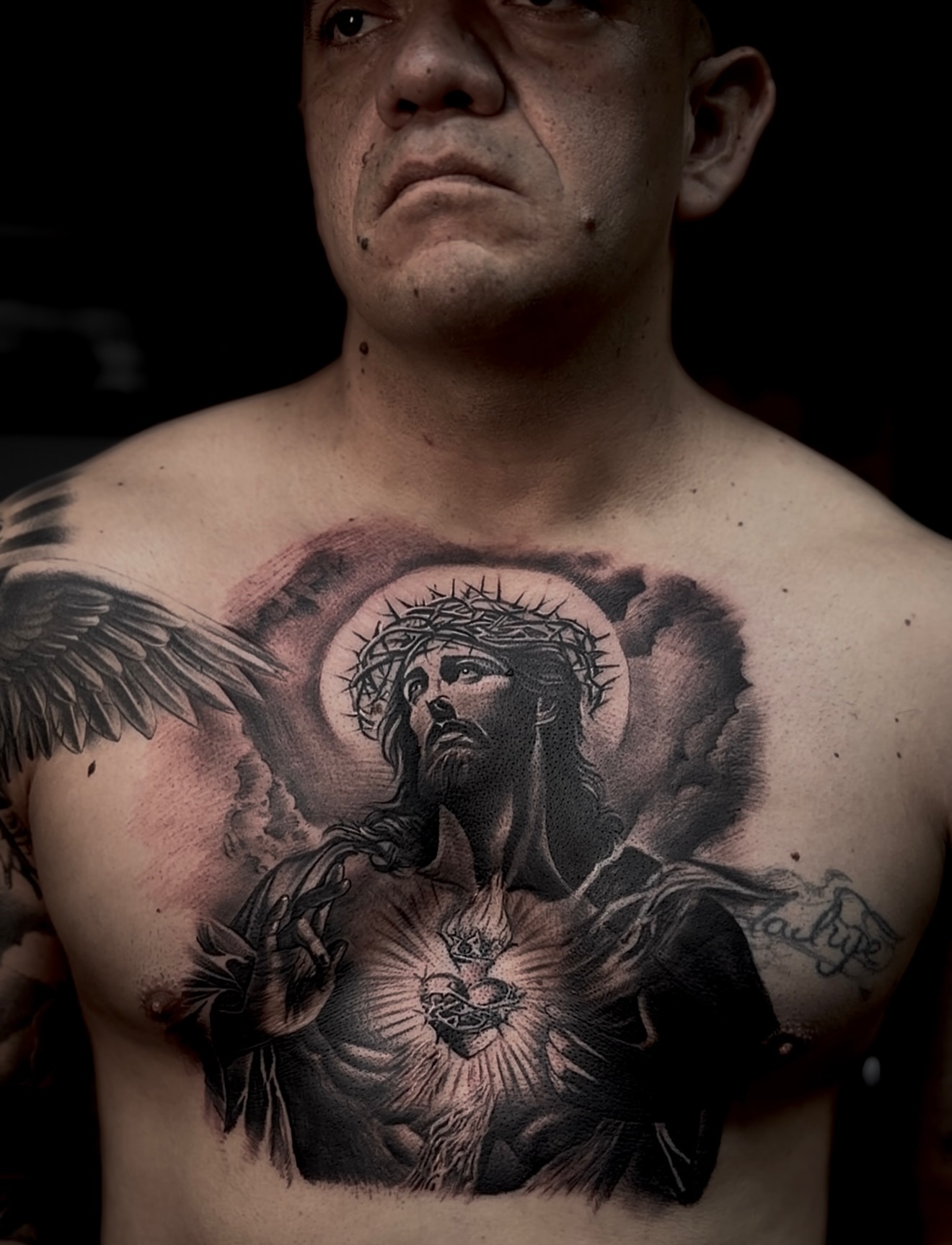 Jesus Christ realism tattoo on the chest by Raul Rodriguez