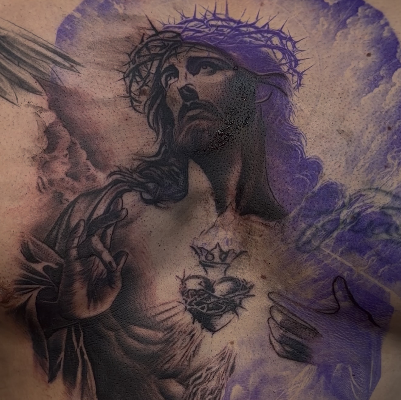 Jesus Christ realism tattoo on the chest by Raul Rodriguez