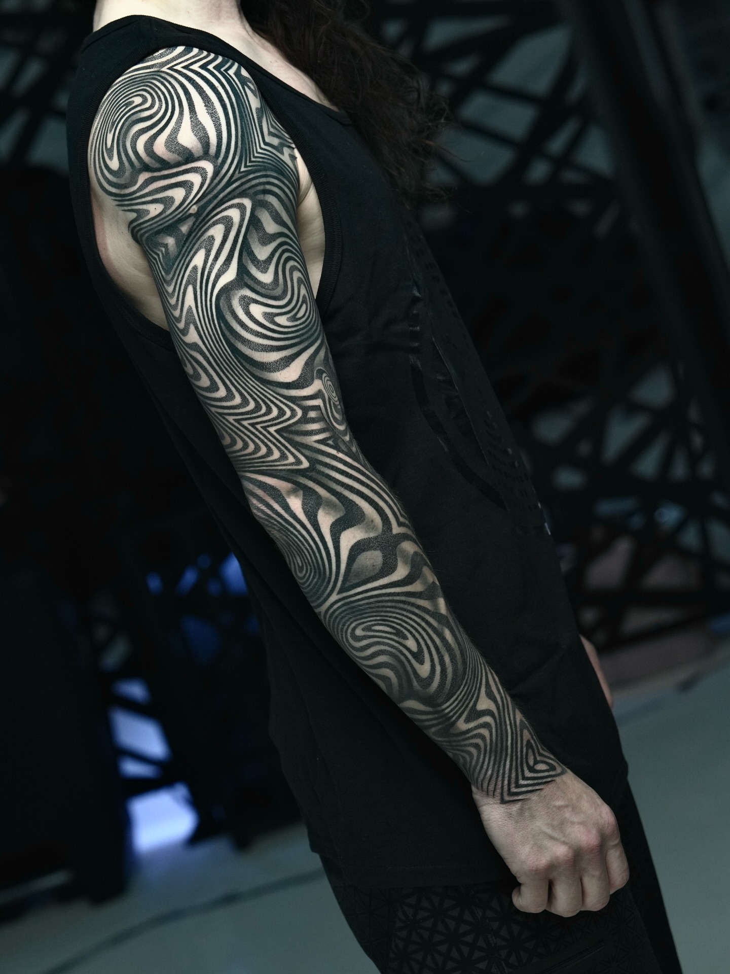 Abstract pattern geometric tattoo on the upper arm by Ilya Cascad Kandaurov