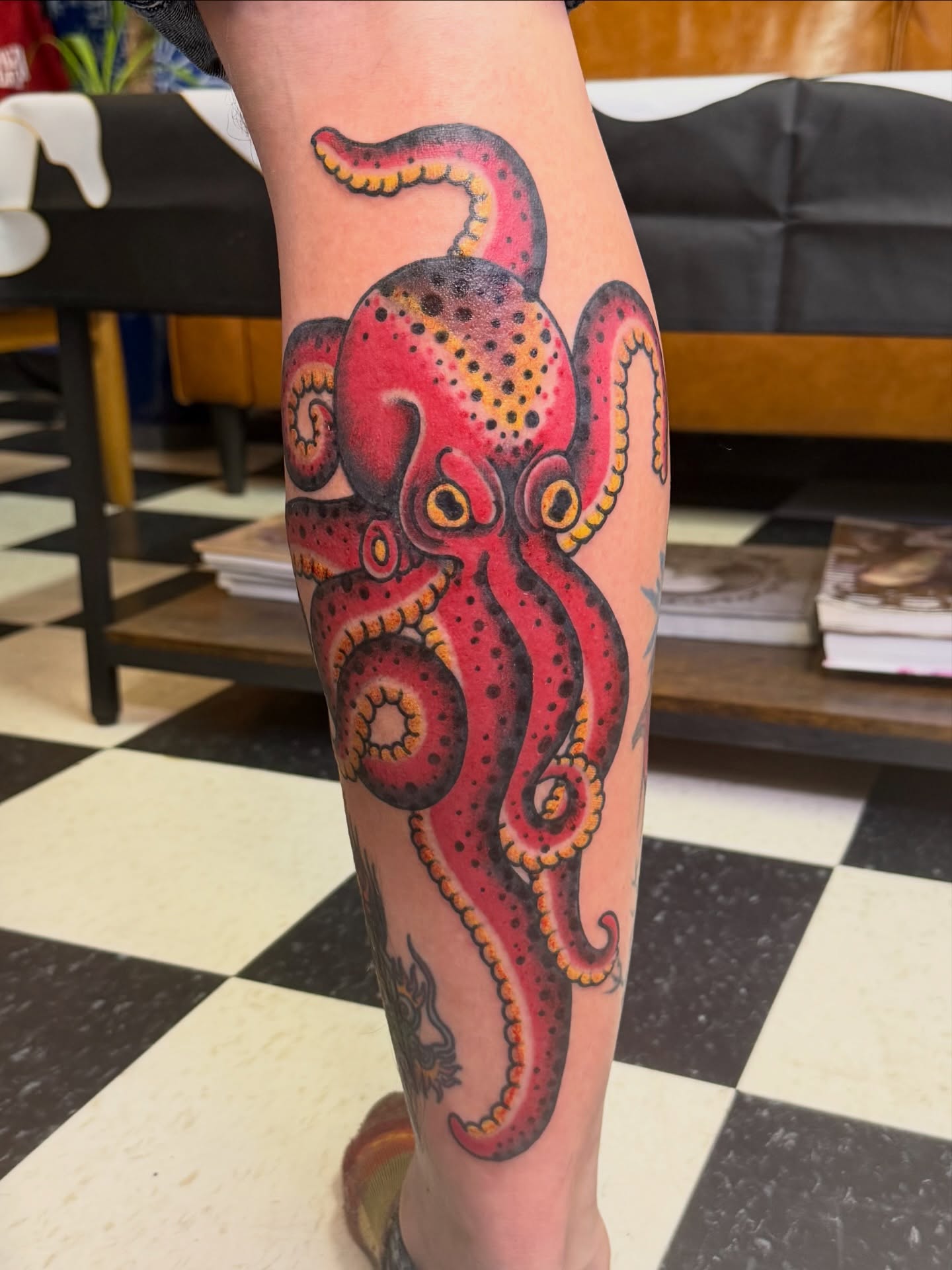 Octopus dotwork tattoo on the calf by Don Robison