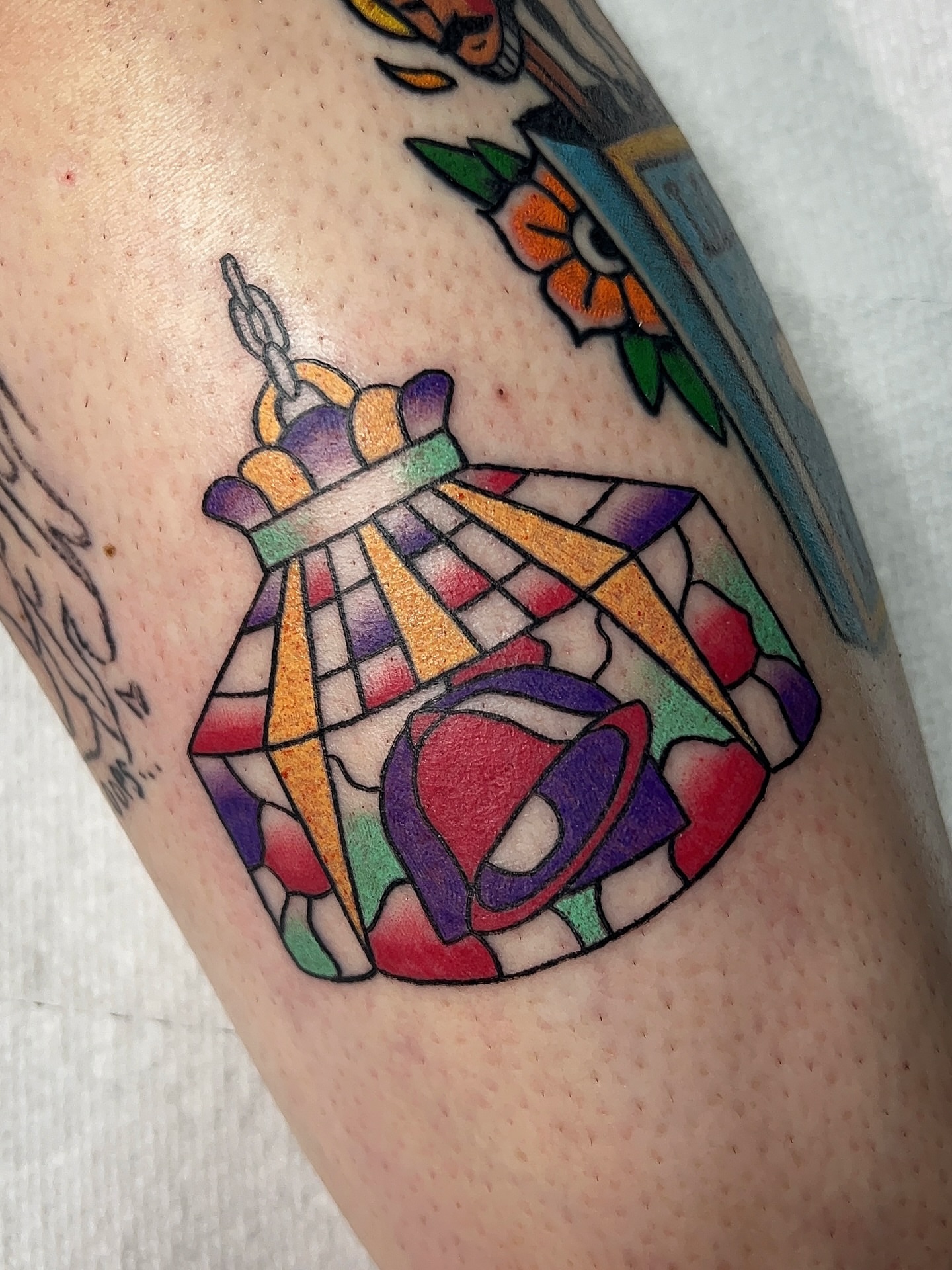 Stained glass window geometric tattoo on the forearm by 𝑴𝒂𝒚𝒂𖤐𝑫𝒆𝑽𝒊𝒏𝒆, Dayton, Ohio