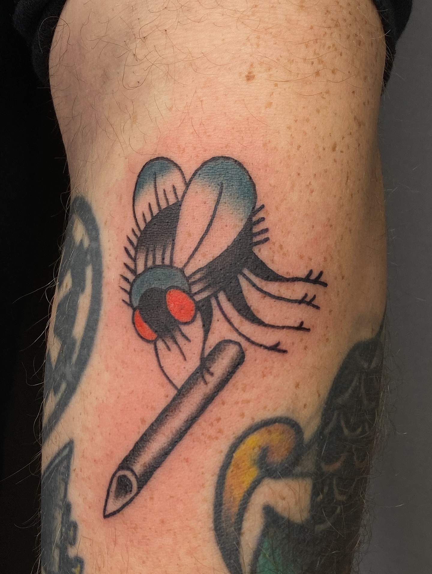 Mosquito American traditional tattoo on the forearm by Corinne Carter
