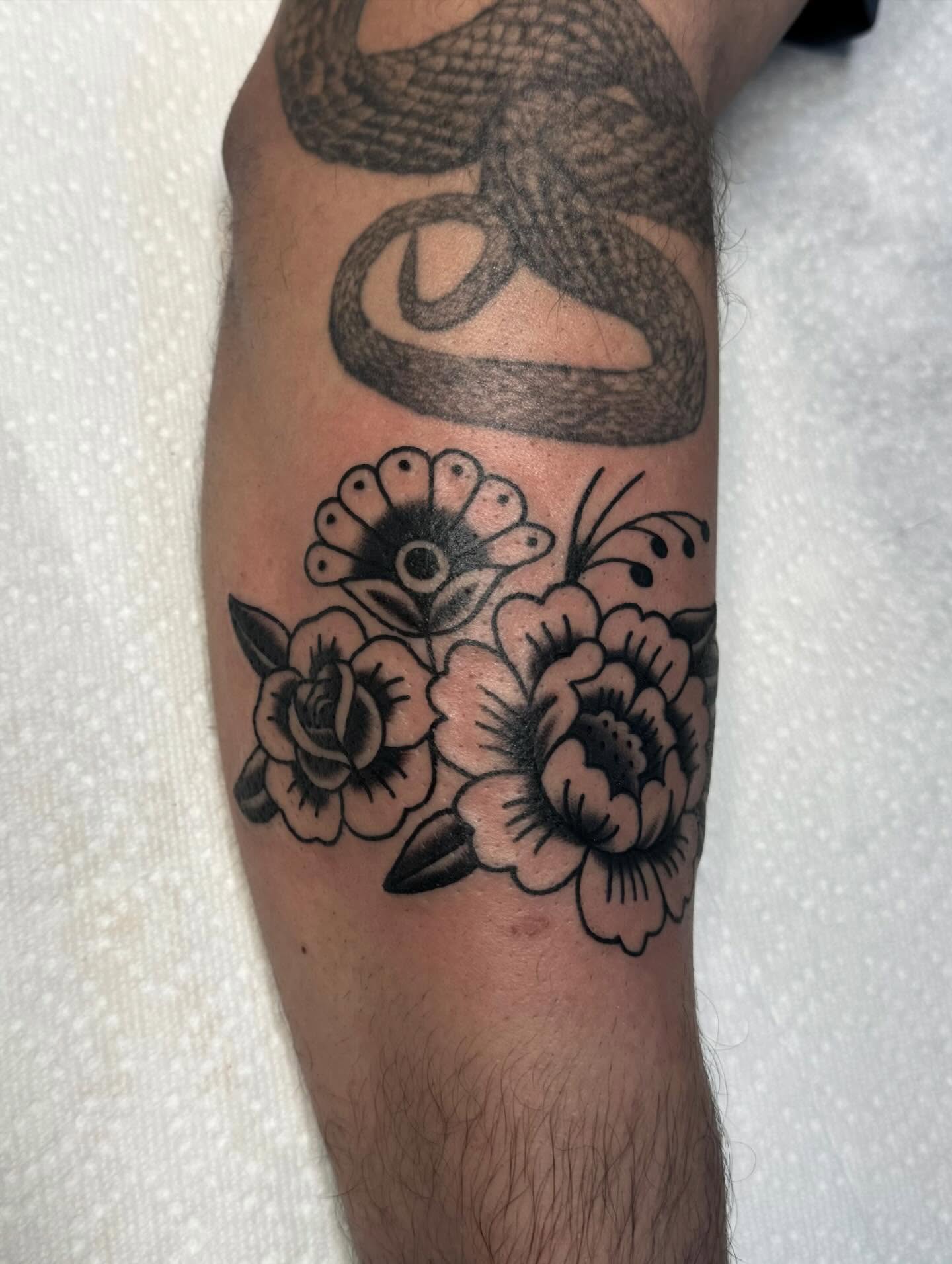 Snake and flowers American traditional tattoo on the forearm by ＊ Carly James ＊