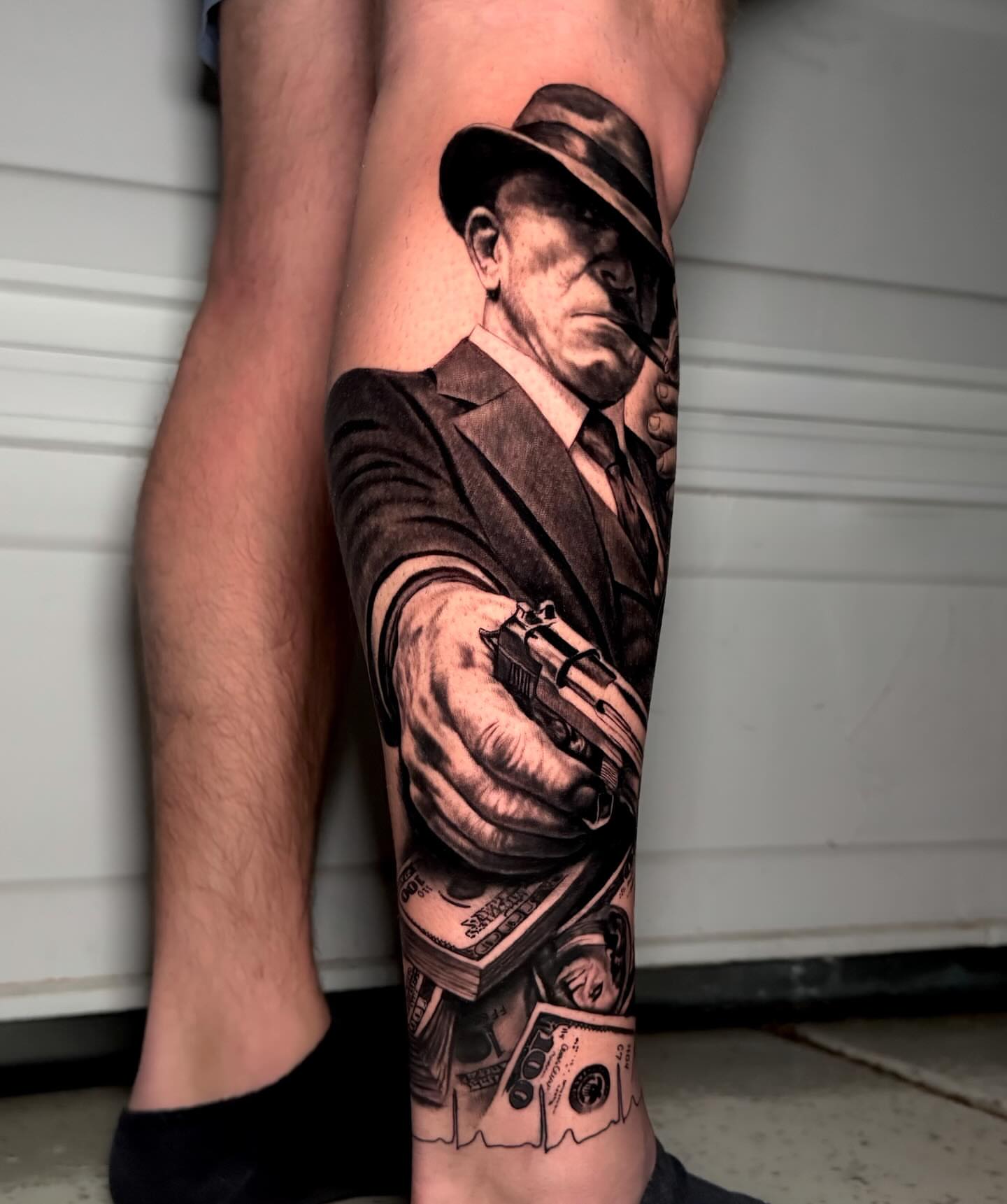 Tattoo by @saint.denis.ink — realism, black_and_grey