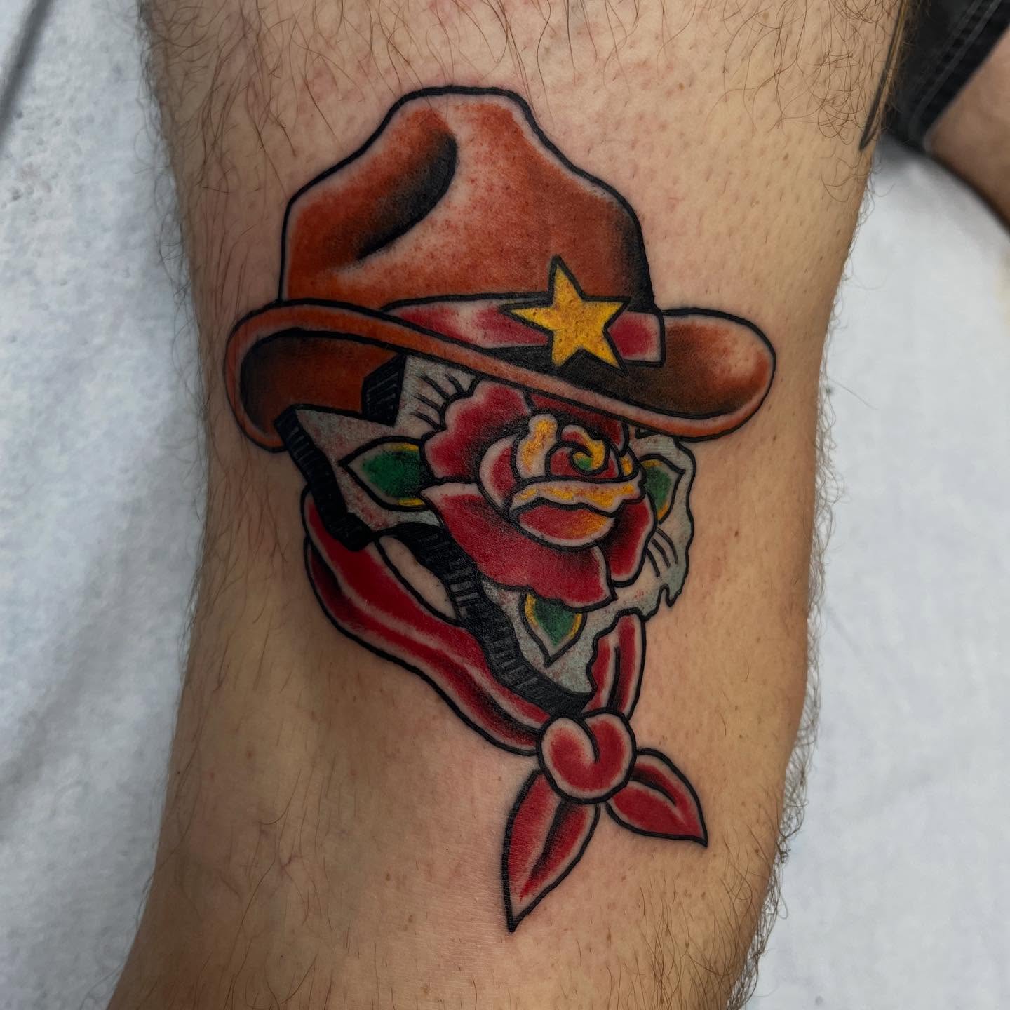 Cowboy hat and rose American traditional tattoo on the forearm by Franky Sharpz