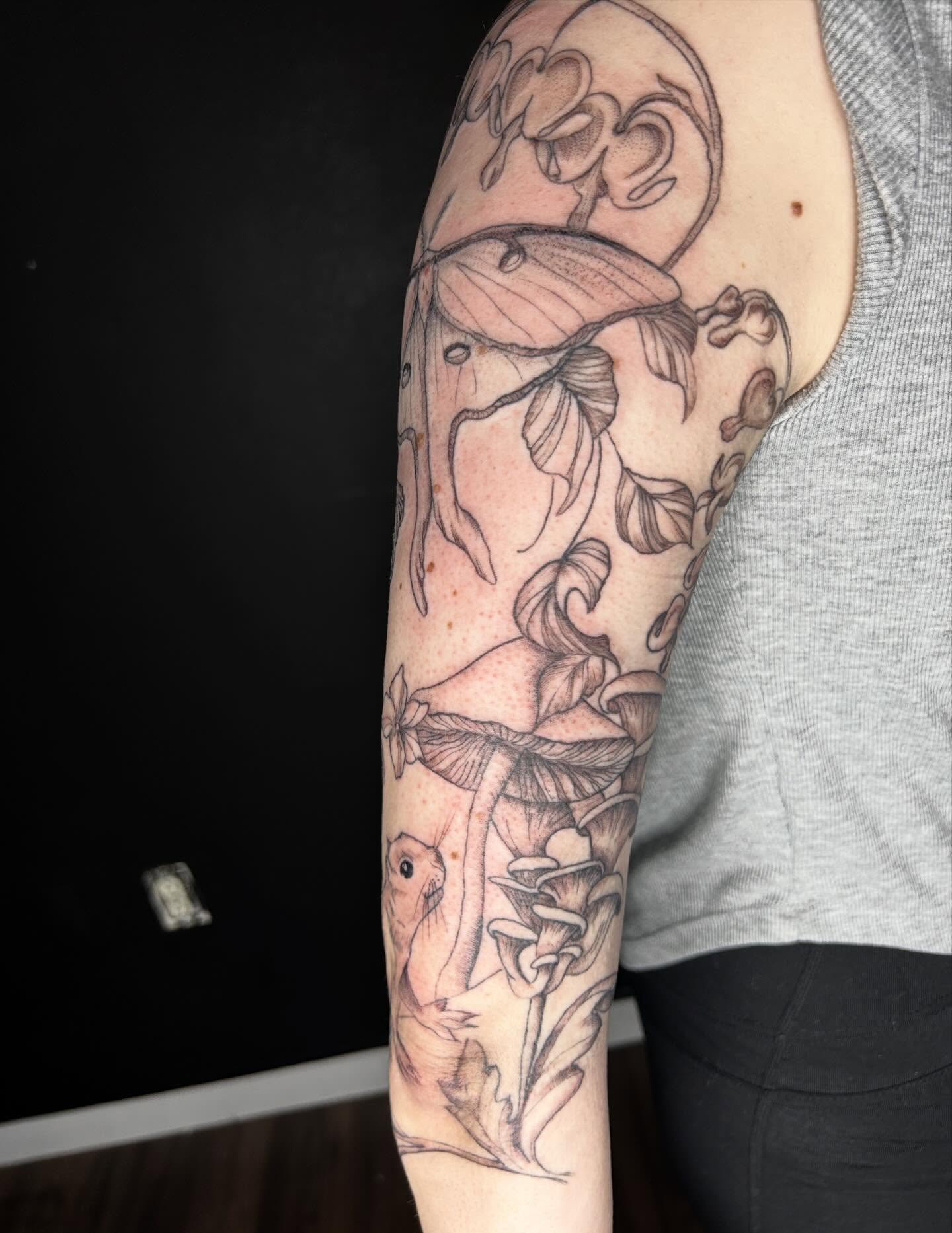 Mushroom and butterfly black and grey tattoo on the forearm by Elizabeth (Lib), Murfreesboro, Tennessee