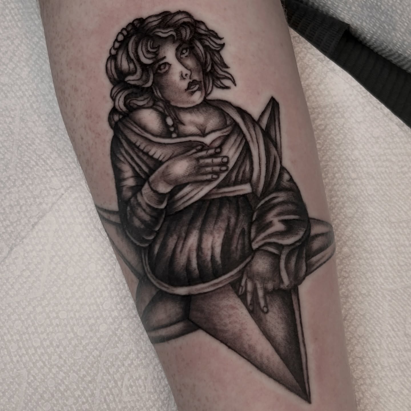 Woman with dagger realism tattoo on the forearm by Kat McCoy Guidera, Nashville, Tennessee
