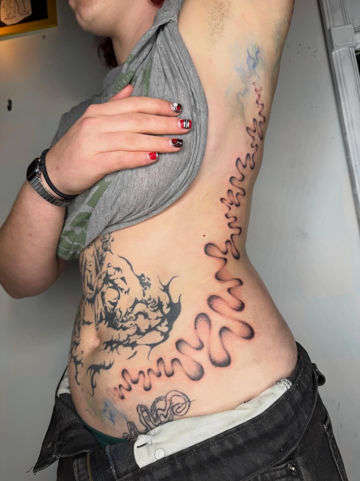 Wave pattern black and grey tattoo on the torso by @mr.smiley___