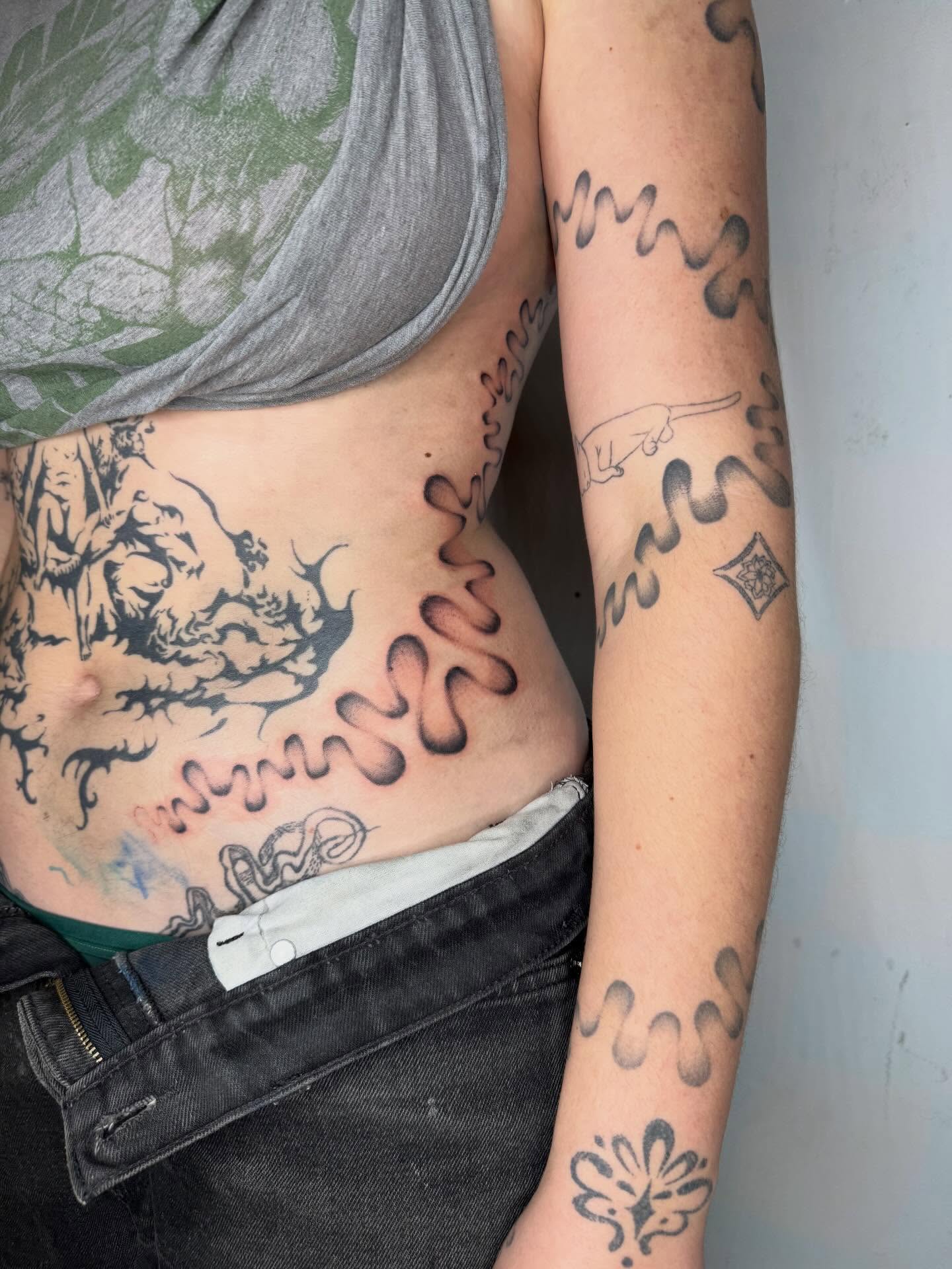 Monster and flames American traditional tattoo on the torso by @mr.smiley___