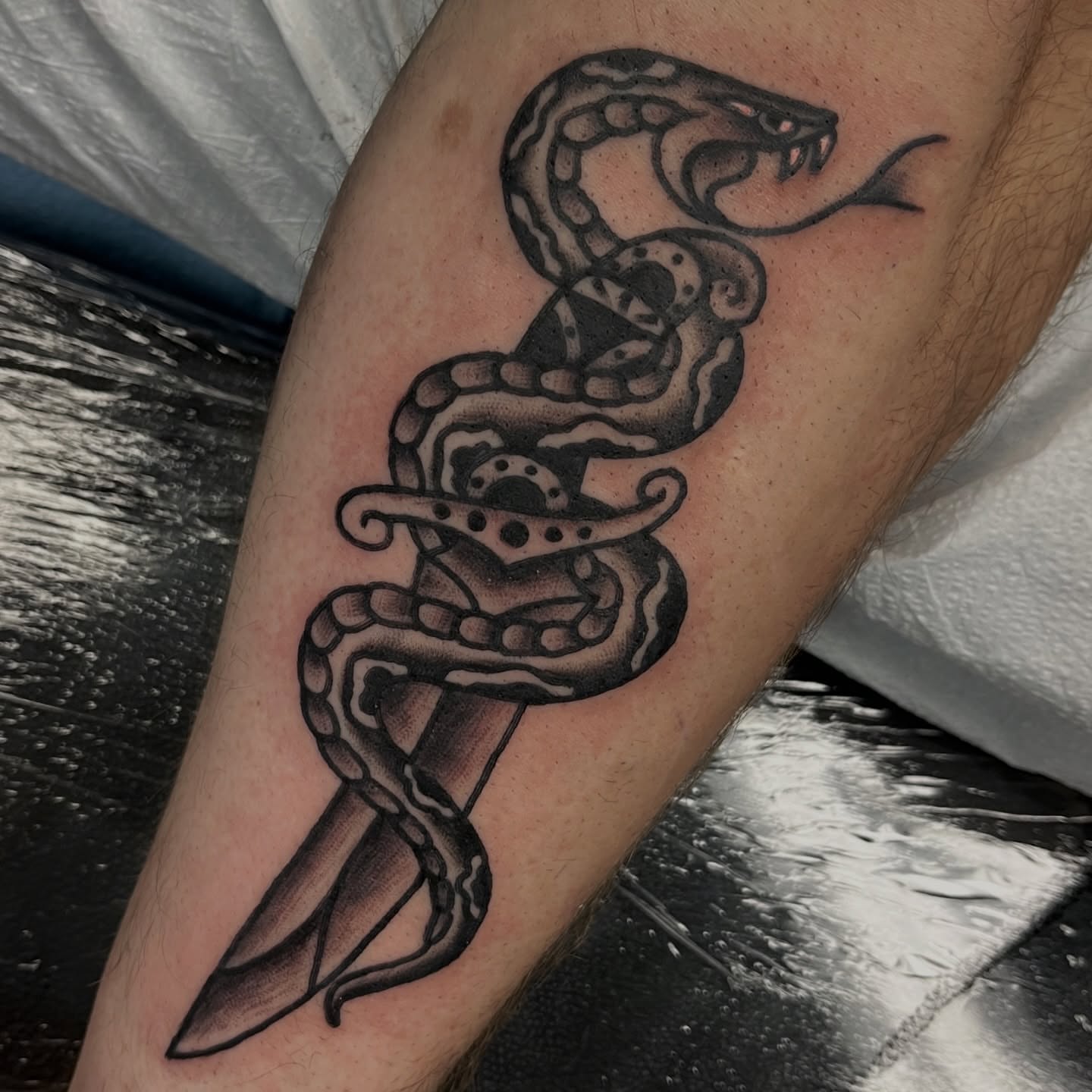 Snake dotwork tattoo on the forearm by You’ll save me in your phone as Tattoo Tim