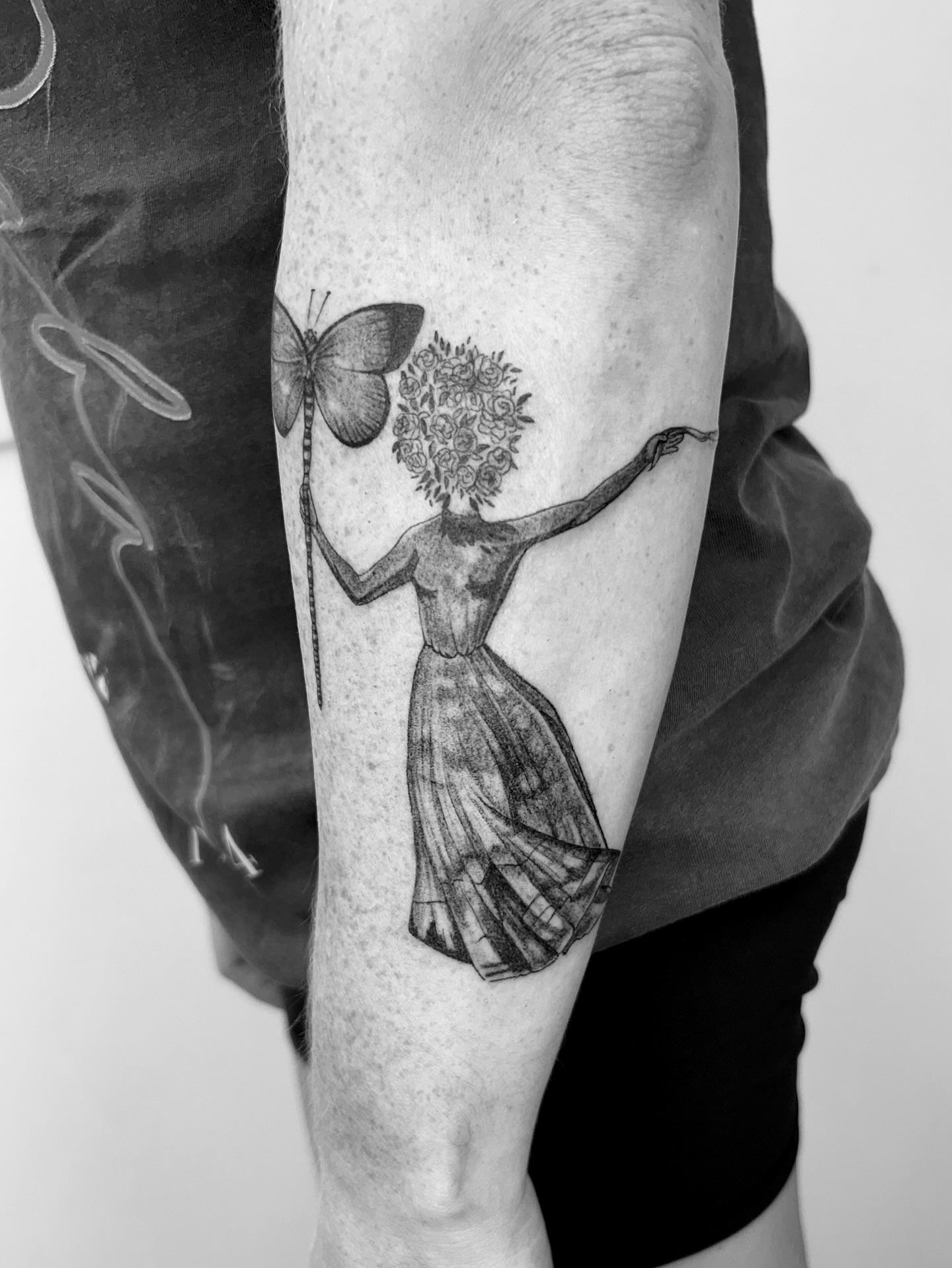 Woman with flower head realism tattoo on the forearm by ☆ Nashville Fine Line Tattoo Artist ☆