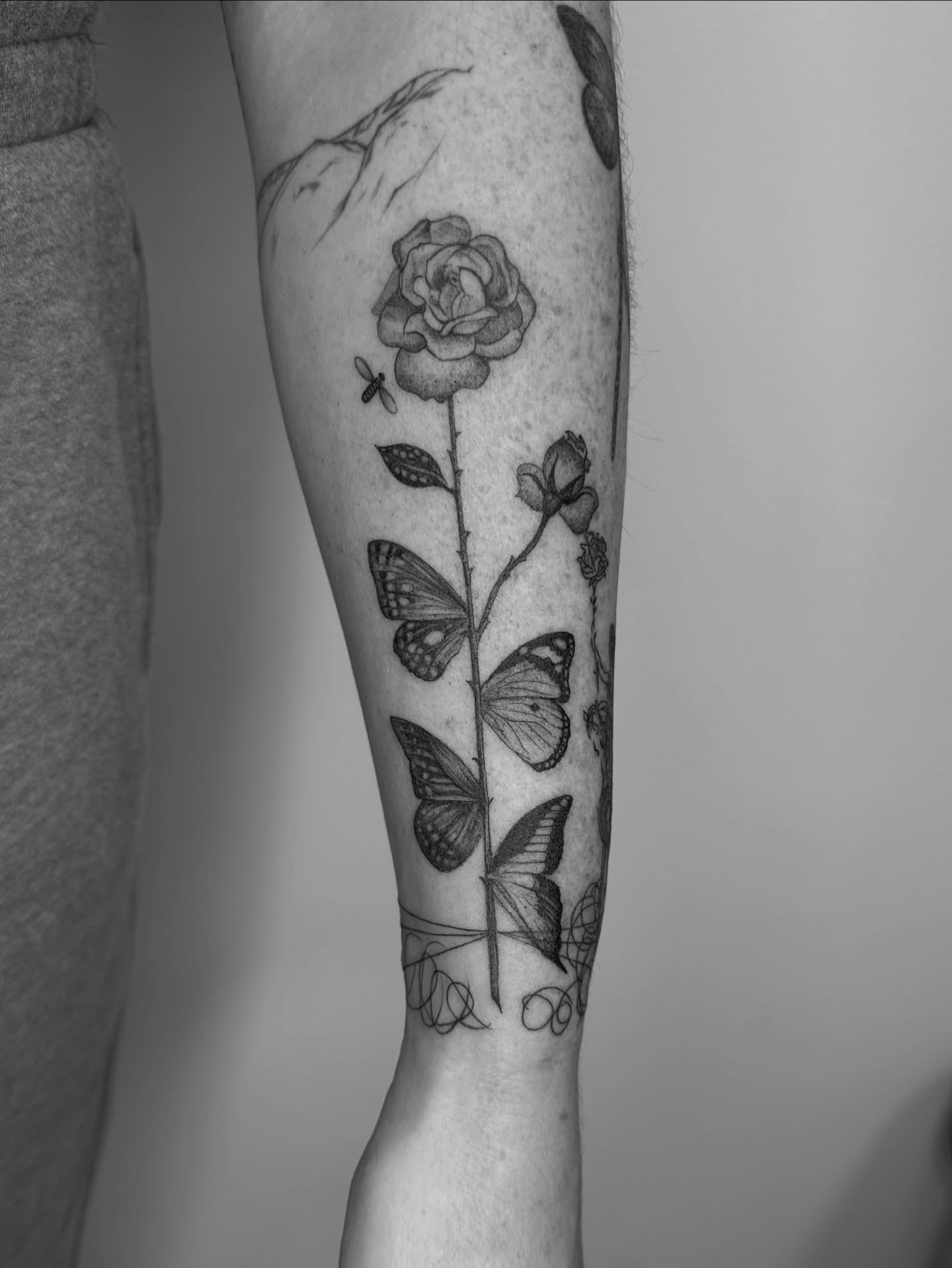 Rose and butterflies realism tattoo on the forearm by ☆ Nashville Fine Line Tattoo Artist ☆
