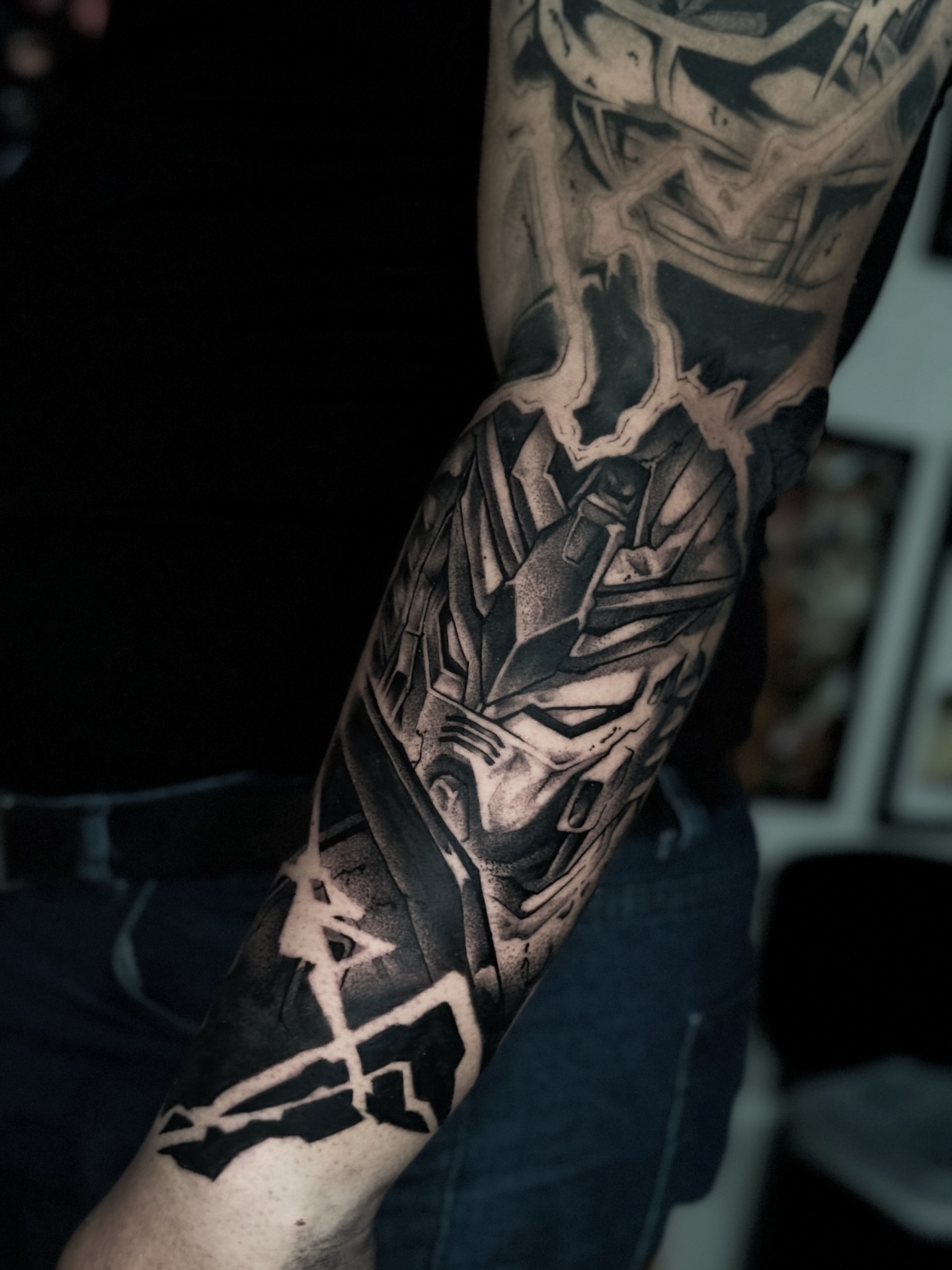 Mecha head geometric tattoo on the forearm by Anime