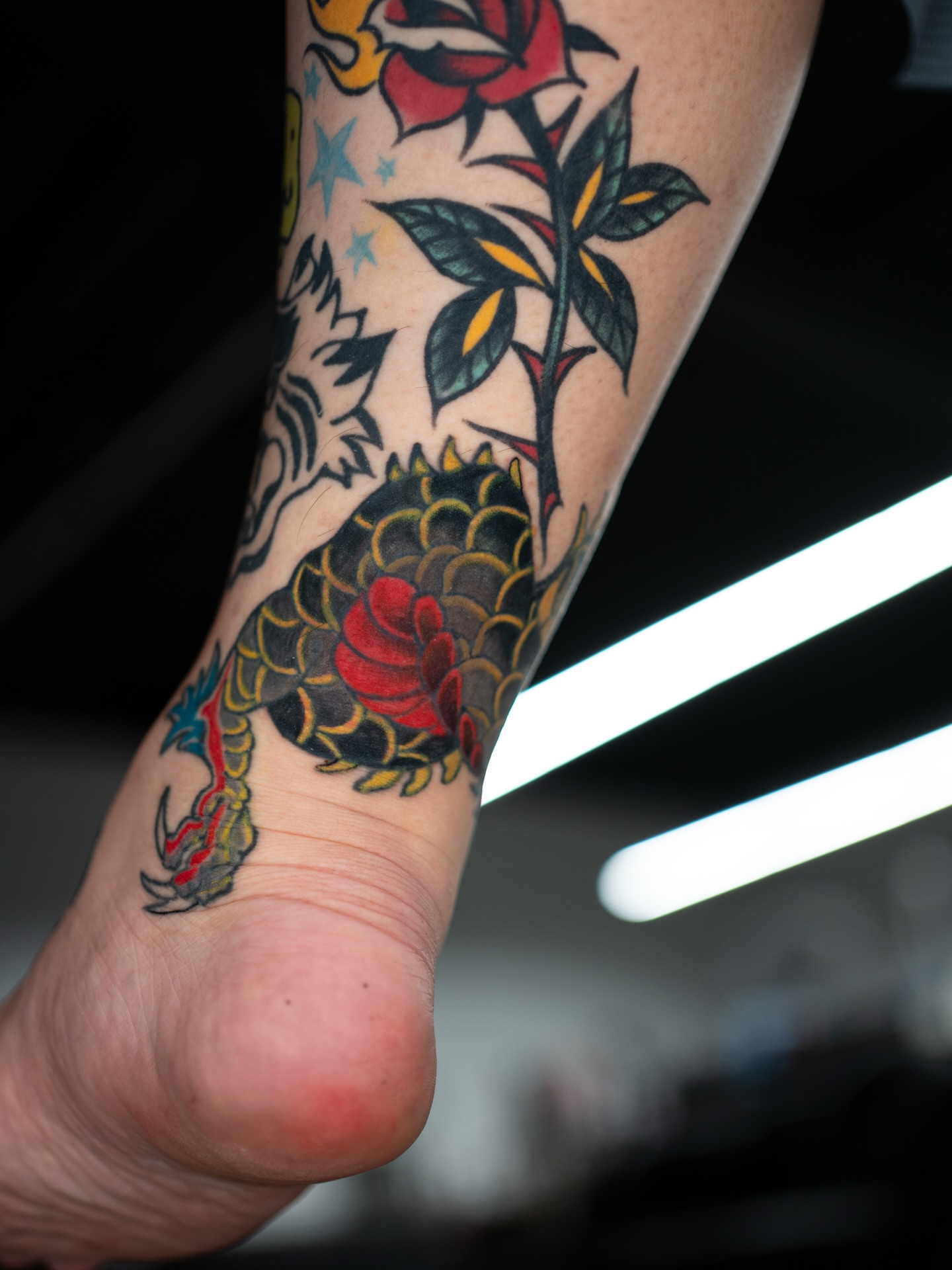 Rose and dragon American traditional tattoo on the forearm by Lancinglove