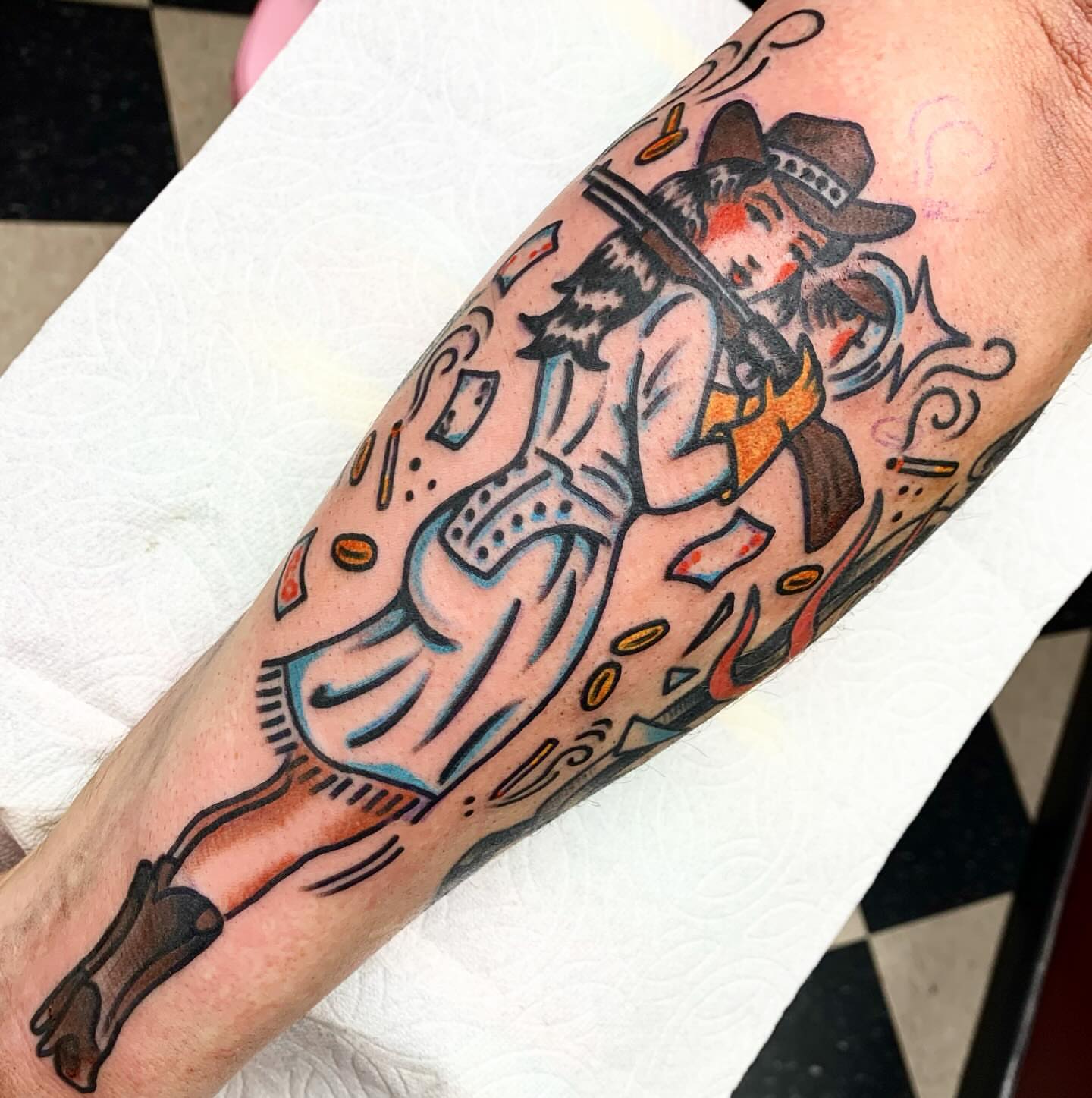 Cowboy American traditional tattoo on the forearm by Los Angeles Tattoo Artist