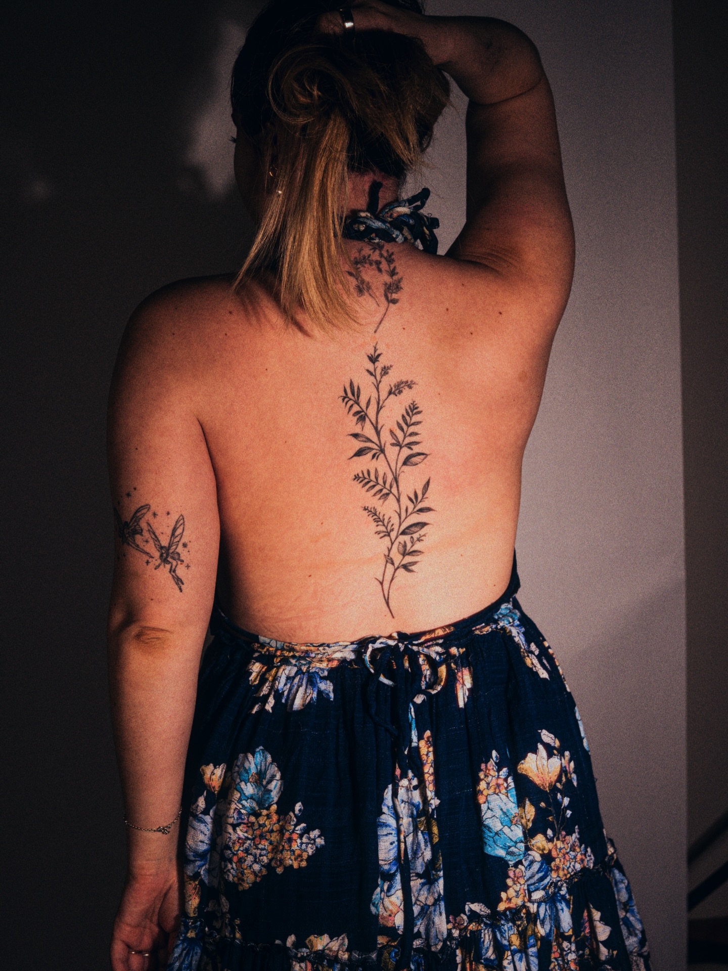 Plant black and grey tattoo on the back by Brad Simmons
