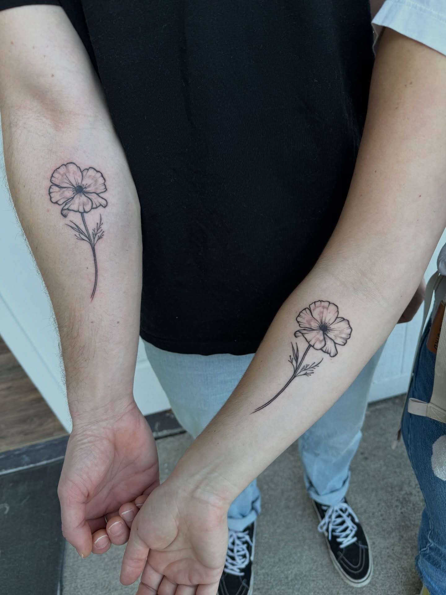 Flower black and grey tattoo on the forearm by Kingtide Ink
