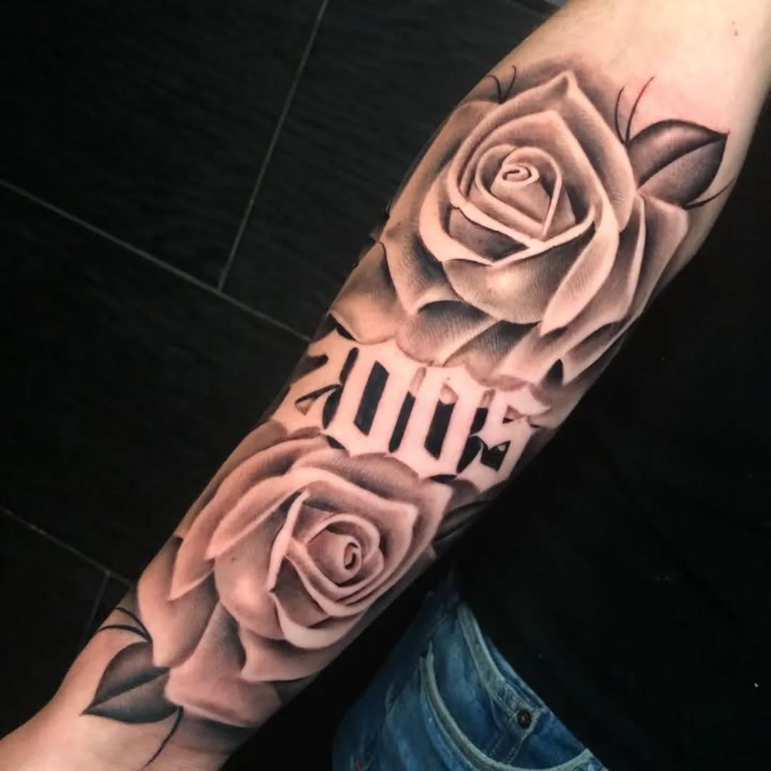 Roses and lettering Chicano tattoo on the forearm by ink.alchemist