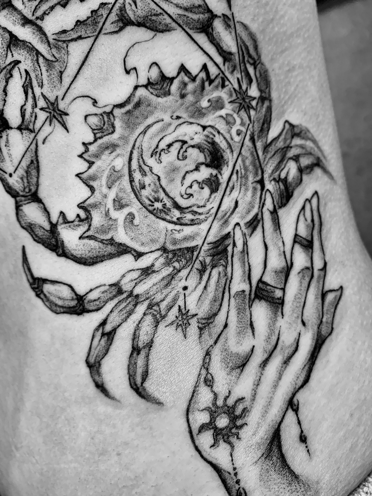 Astronomy-themed hands realism tattoo on the thigh by 21 tattooist