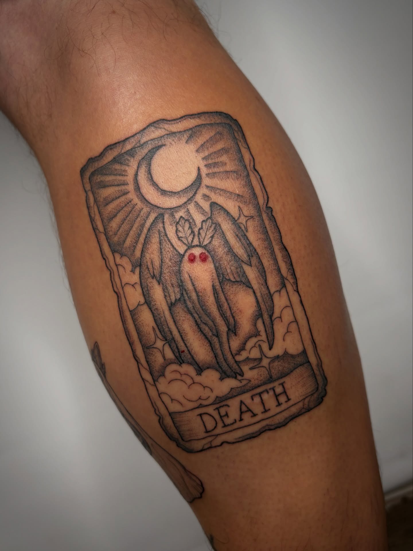 Death card black and grey tattoo on the forearm by Poppy Olivia Deards